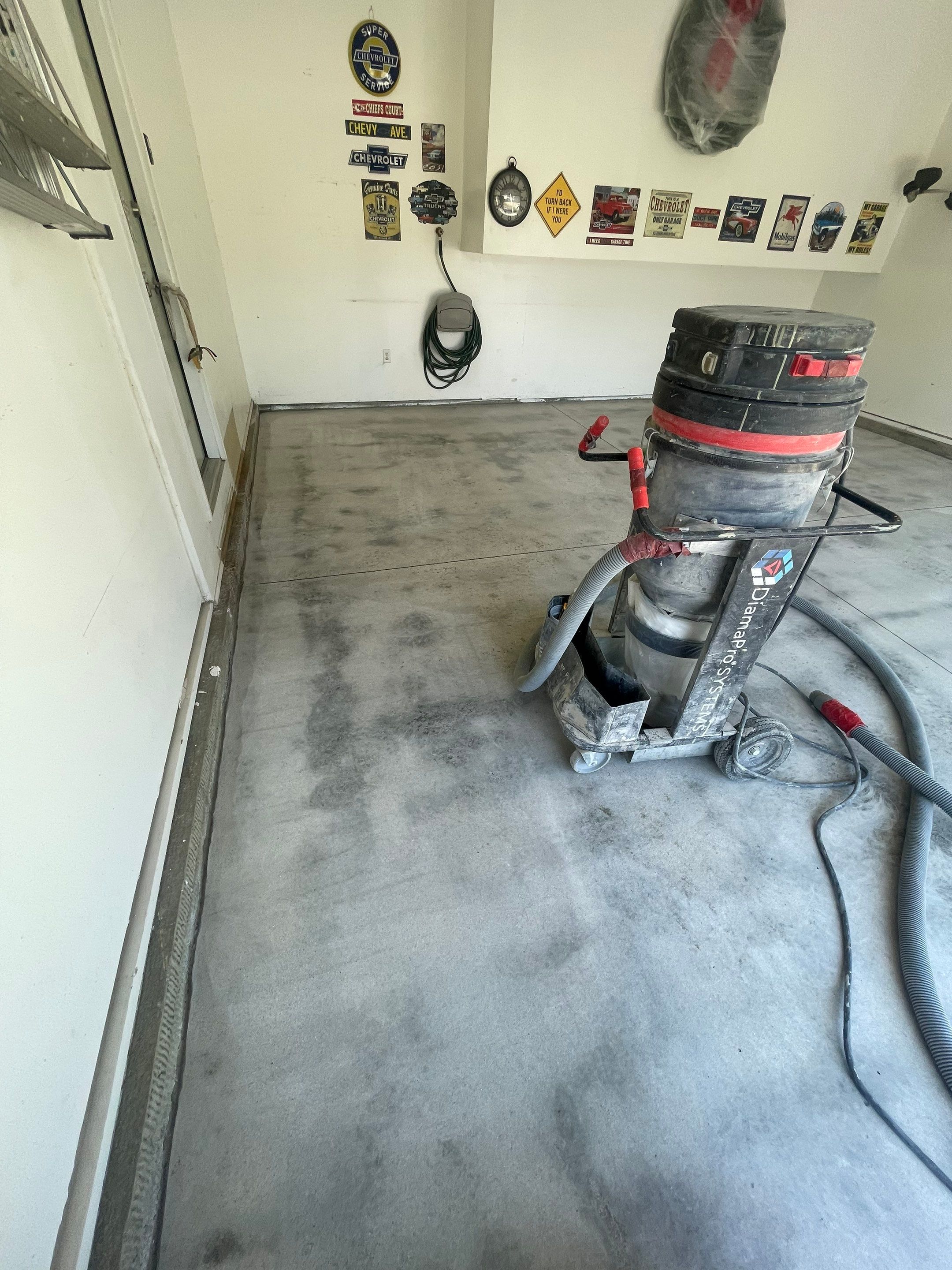 Sioux Falls Garage Floor Coating with Nightfall Decorative Chips by Select Painting, Coatings & Garage Cabinets