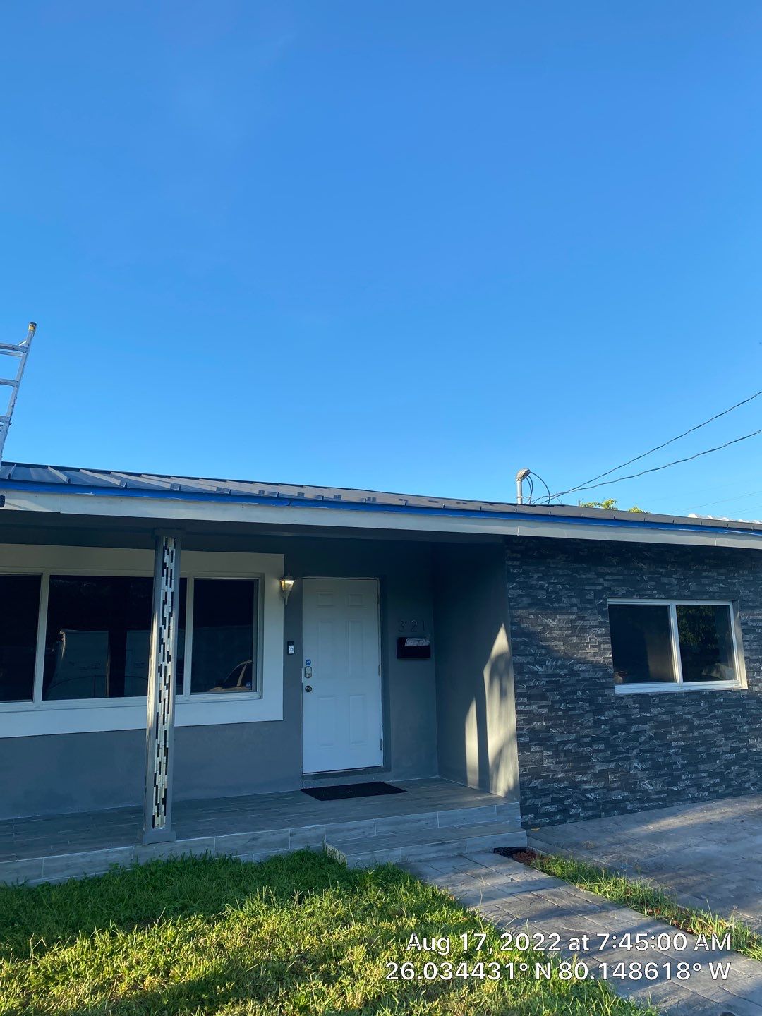 Standing Seam Metal & Flat Re-Roof using 1.5" Nail Strip 24ga Black Matte Kynar Coated Standing Seam Metal Panels by Morton Roofing, Inc.