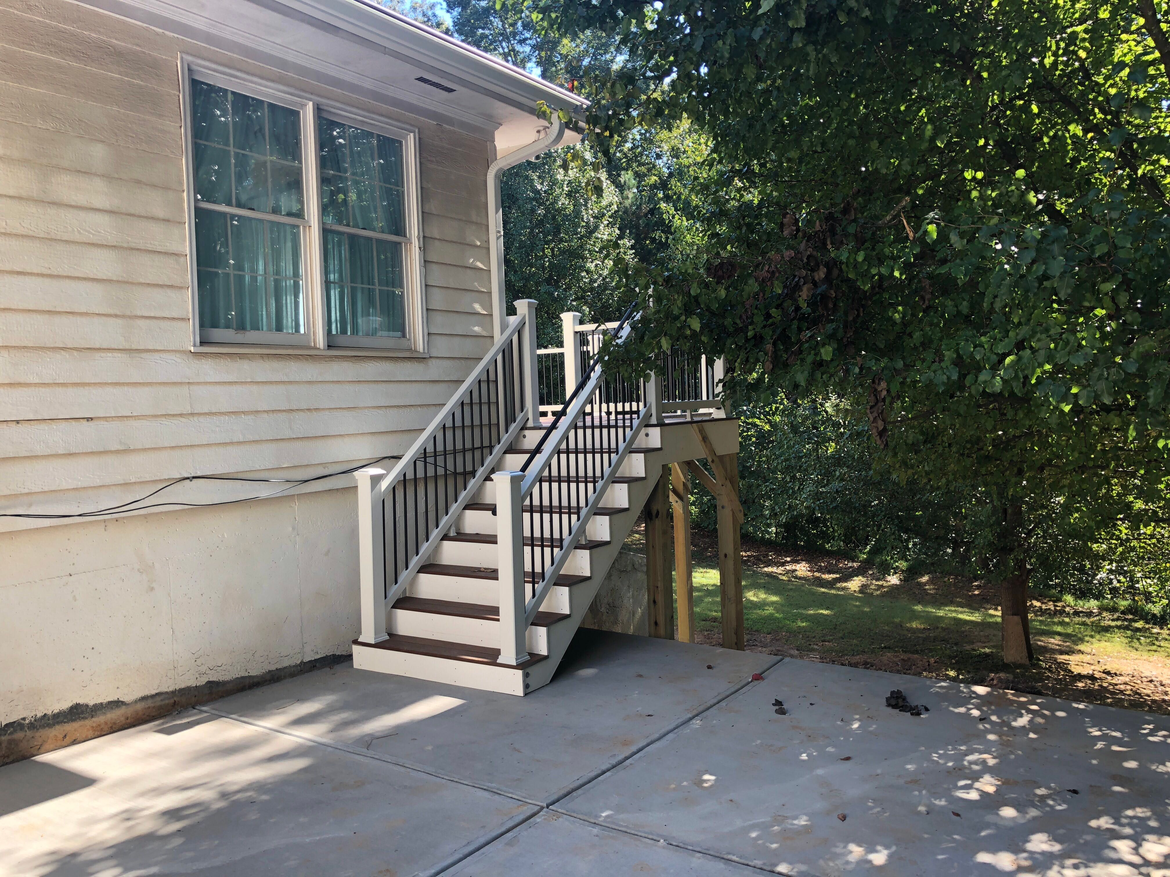Elevated Composite Deck and Concrete Patio Installation in Atlanta by Swift Home Renovations