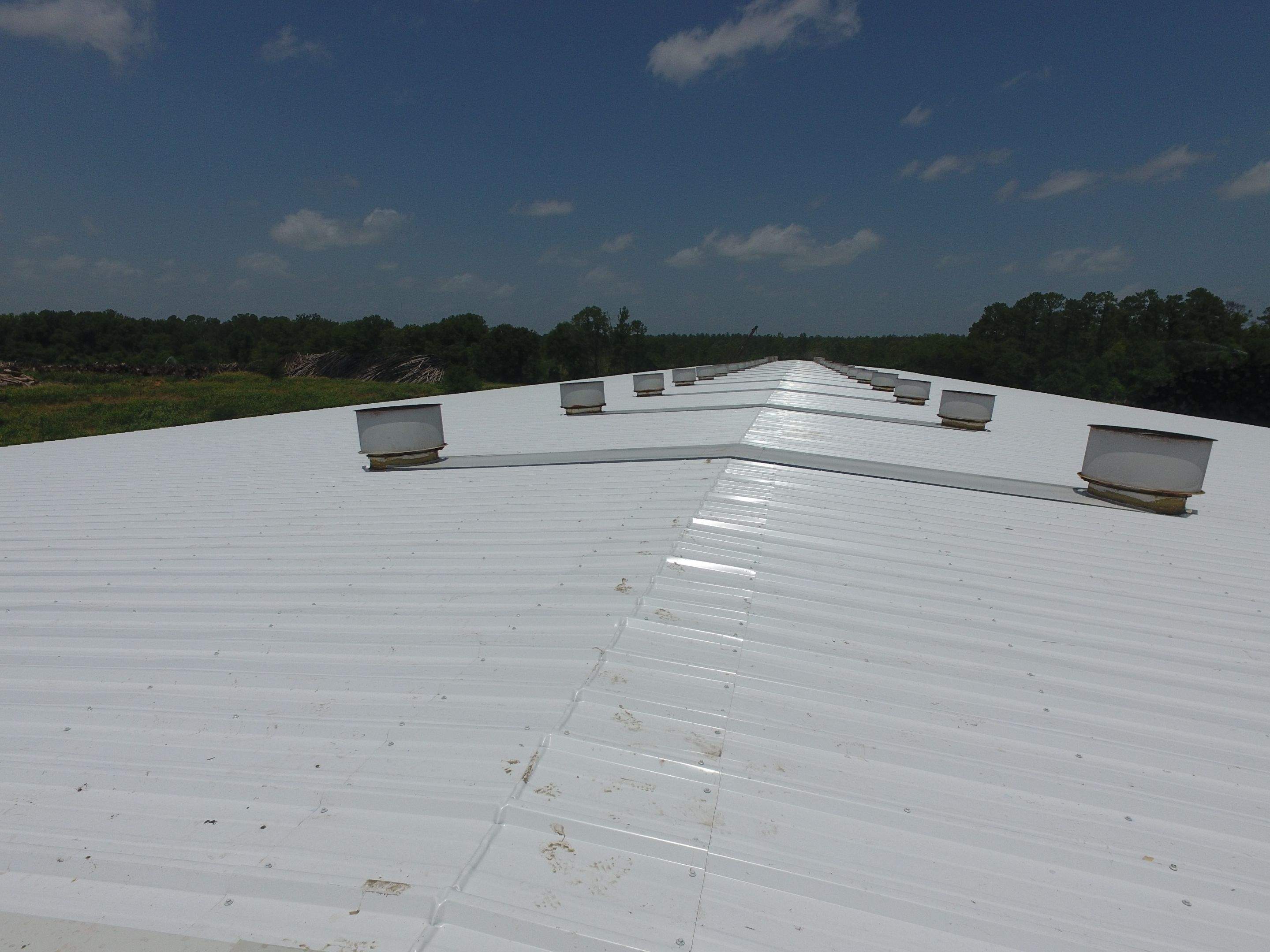 Commercial Roofing Installation using Aluminum Roofing panels by Hostetler Roofing