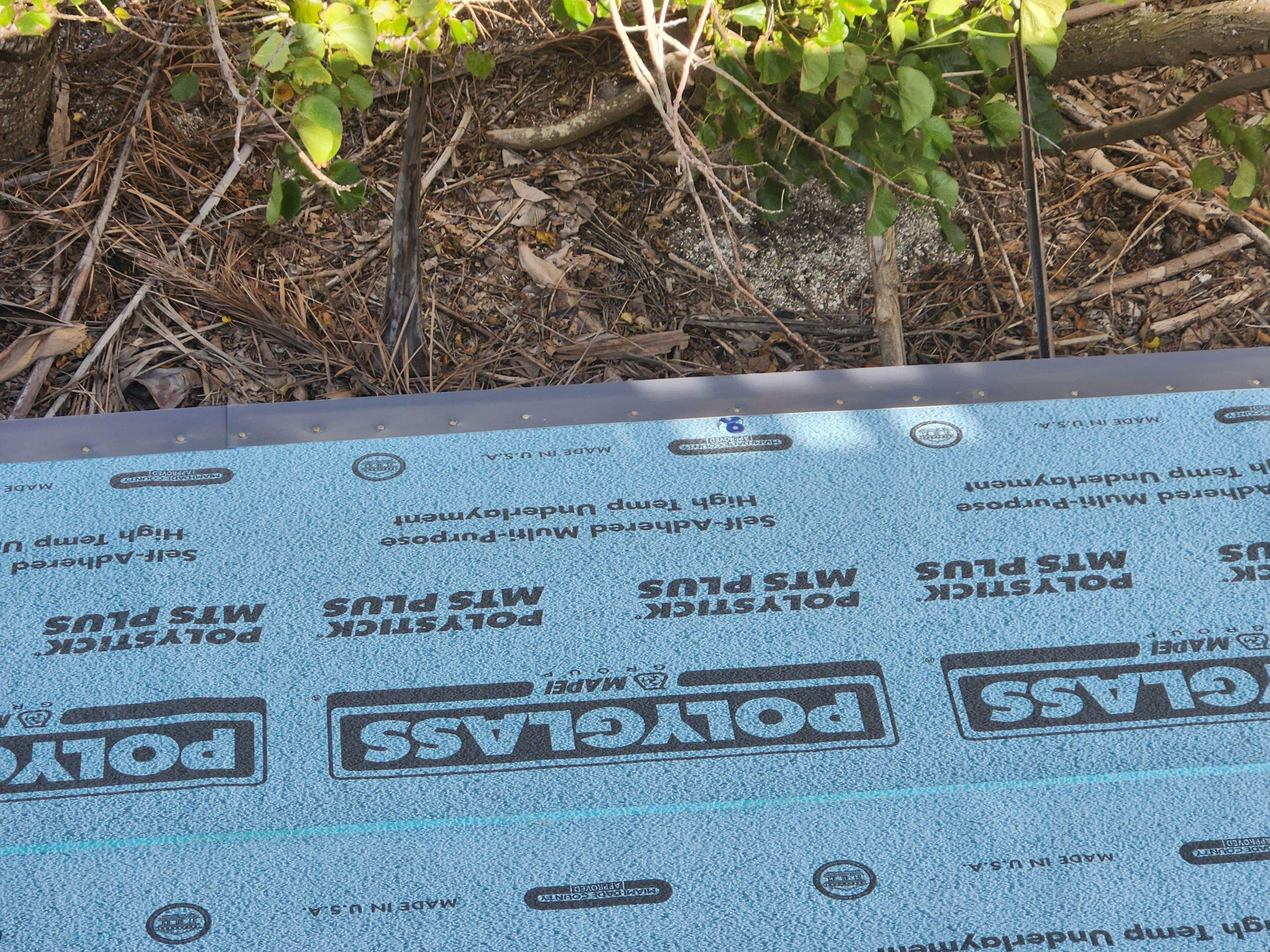Residential Roofing Installation using Gulf Coast Metals Gulf Seam Panels by Four Peaks Roofing