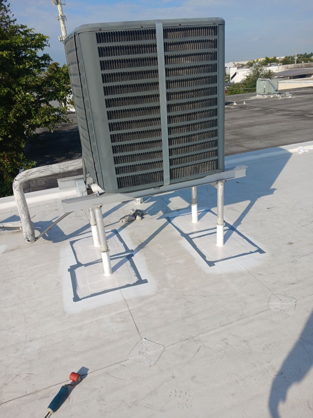 Commercial TPO Flat Roof Installation for Doral Industrial Building by AJF ROOFING INC