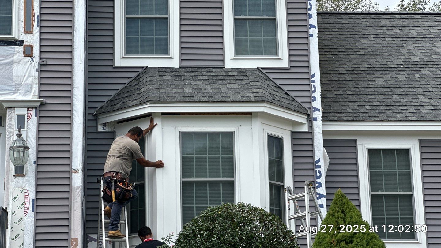 Roof, Trim, Deck, and Gutter Restoration by Mighty Dog Roofing of Greater Middlesex County