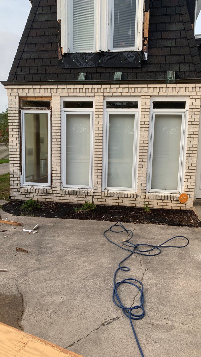 Mansard Charm by Bayfront Roofing and Construction