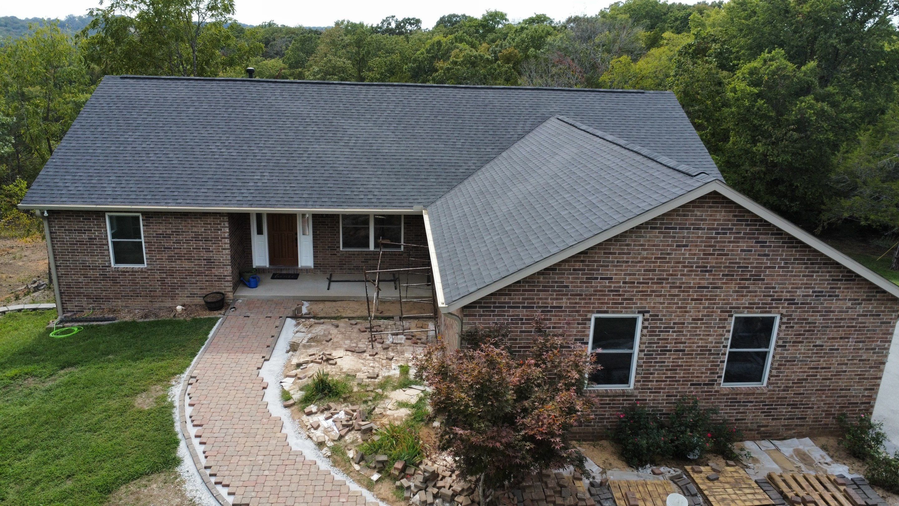 Residential Roofing + Gutters & Downspouts Install  by Titan Commercial & Residential Roofing 