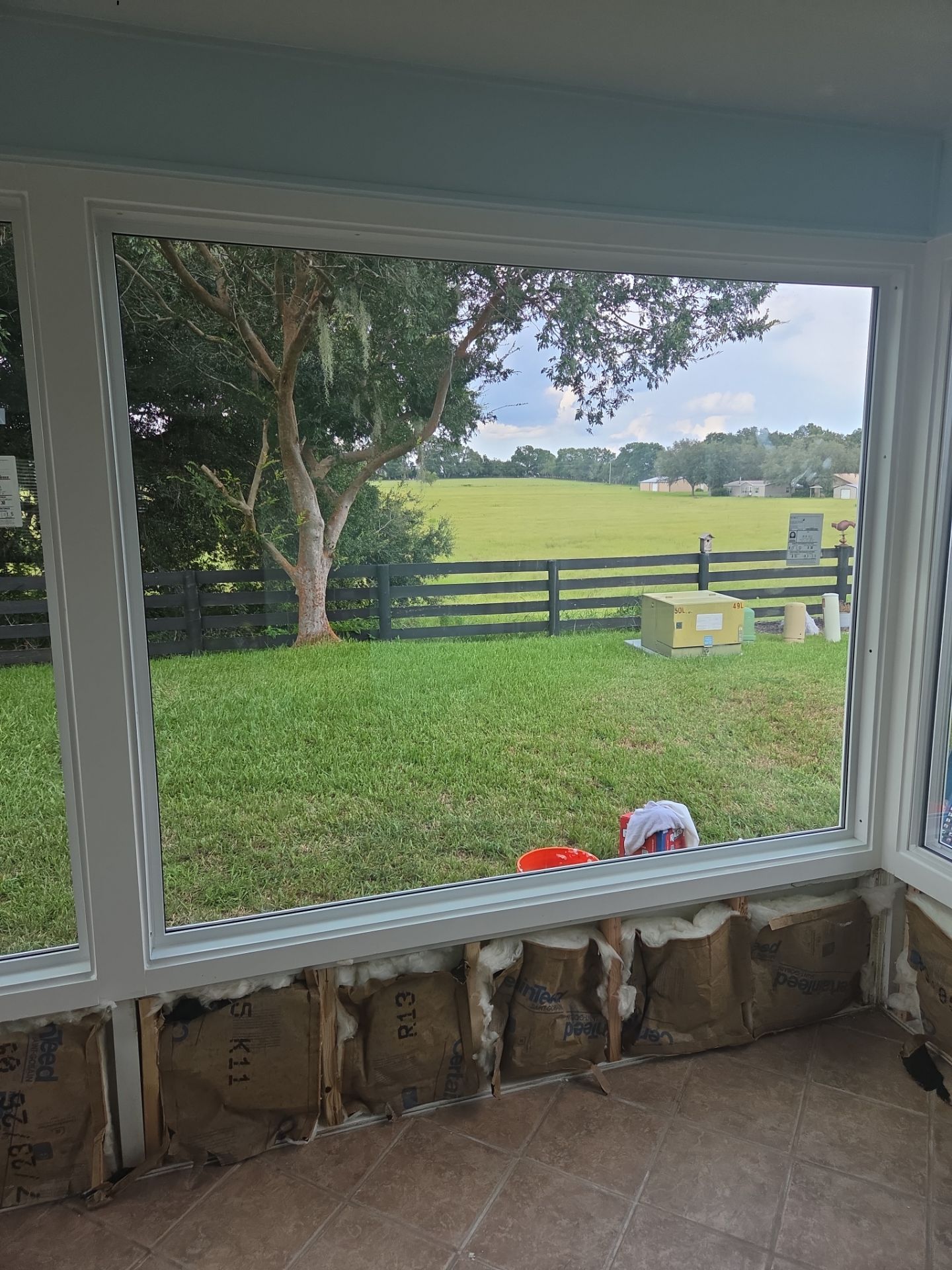 Sunroom Conversion with Alside Windows and Provia Door in The Villages by Windows & Doors Store