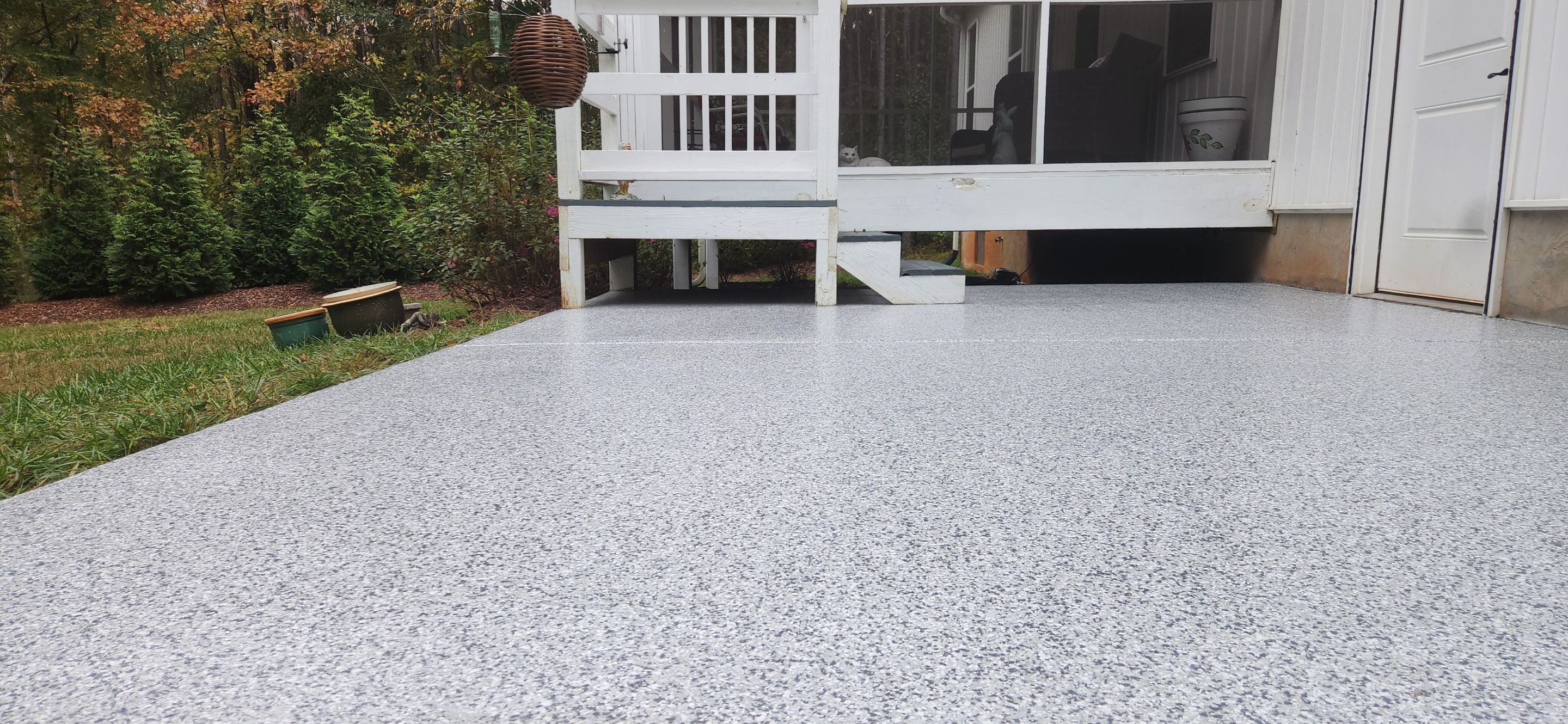 Back Patio using Gravel by Elite Floor Solutions