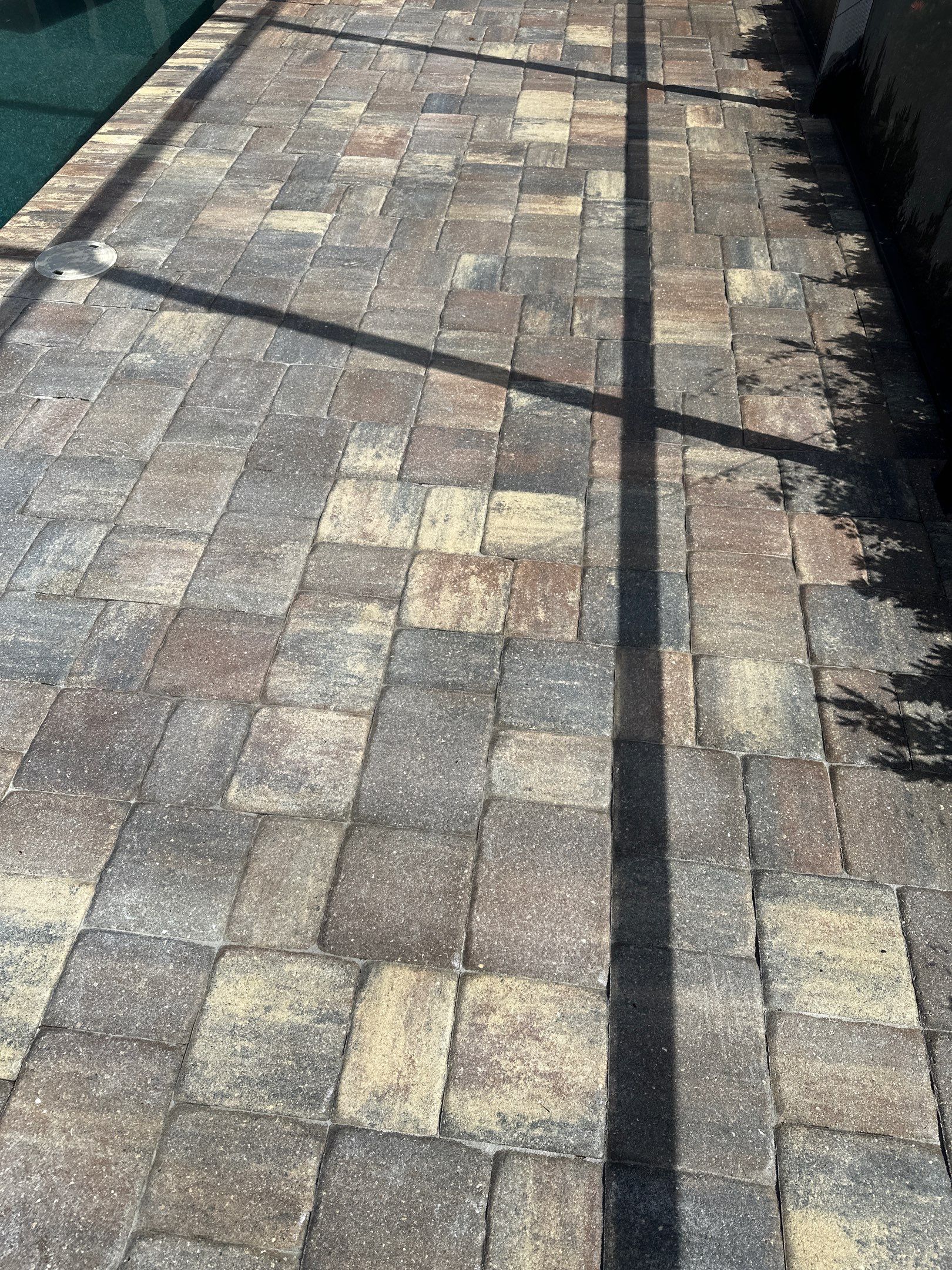 Paver Driveway, Sidewalk, and Pool Deck Cleaning in Winding River Community, Bradenton, FL by Sunshine AquaWash