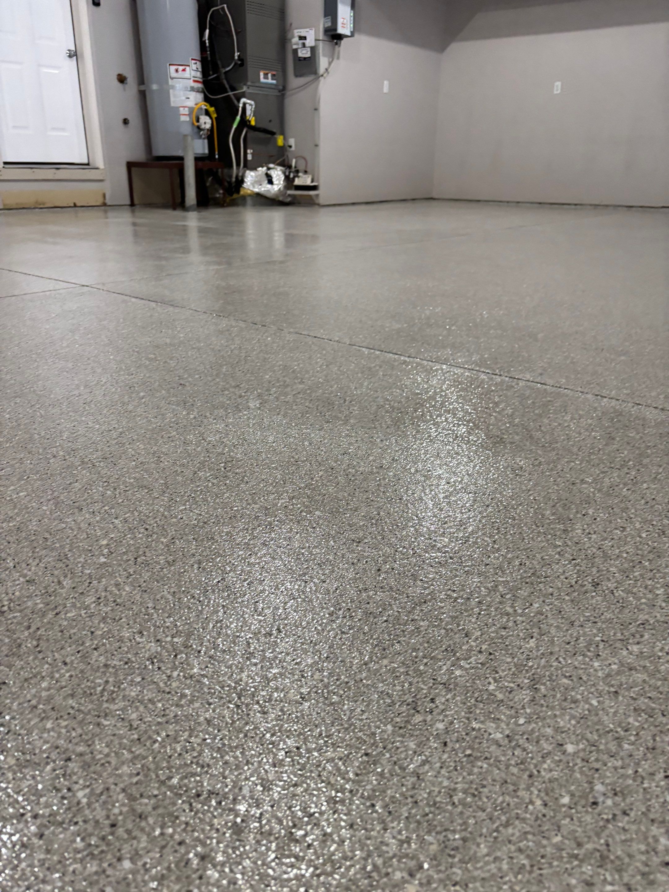 Garage Transformation using Limestone Hybrid by Croc Coatings, LLC