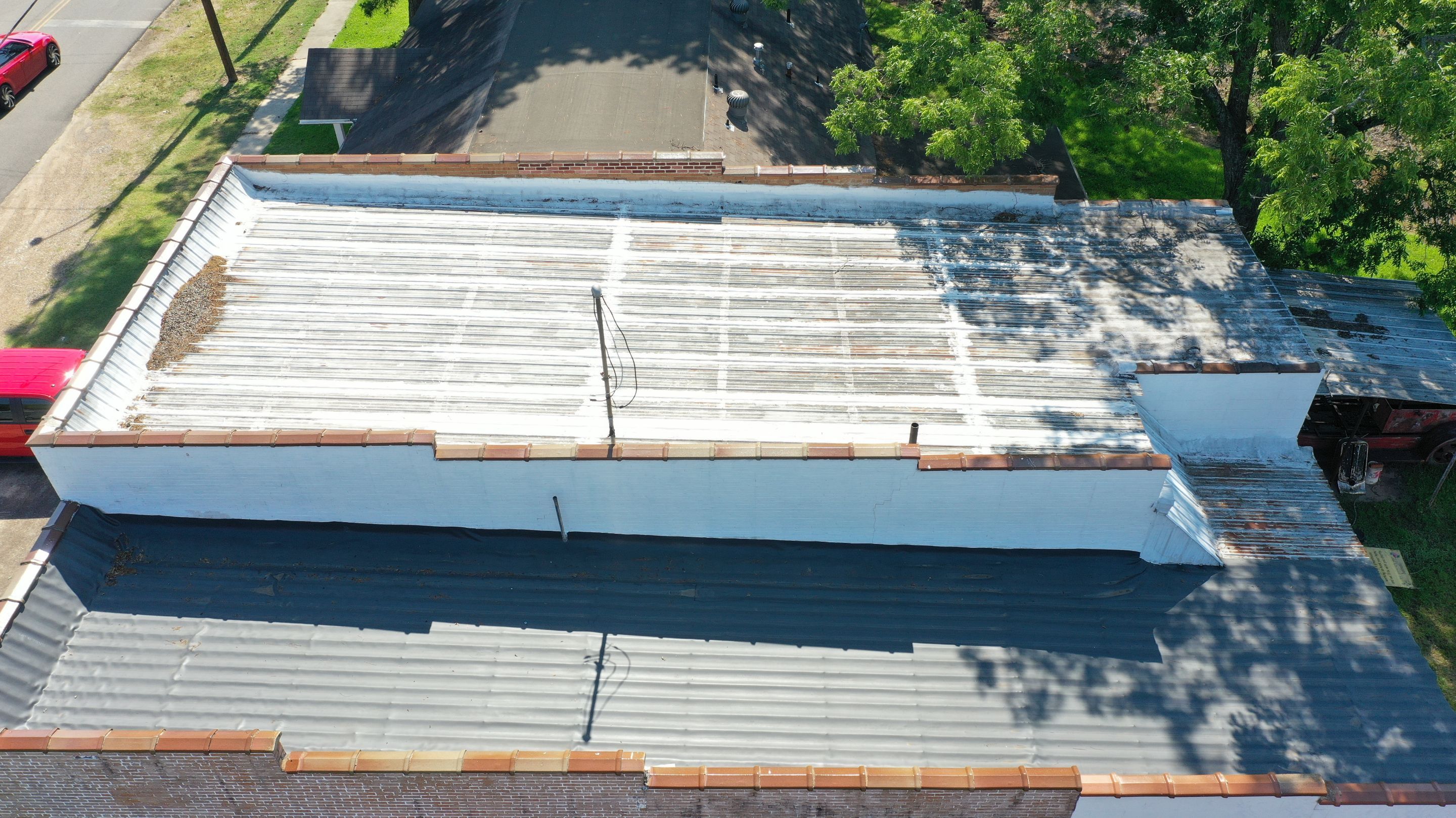 Commercial Roofing Installation using Aldocoat Coatings by Hostetler Roofing