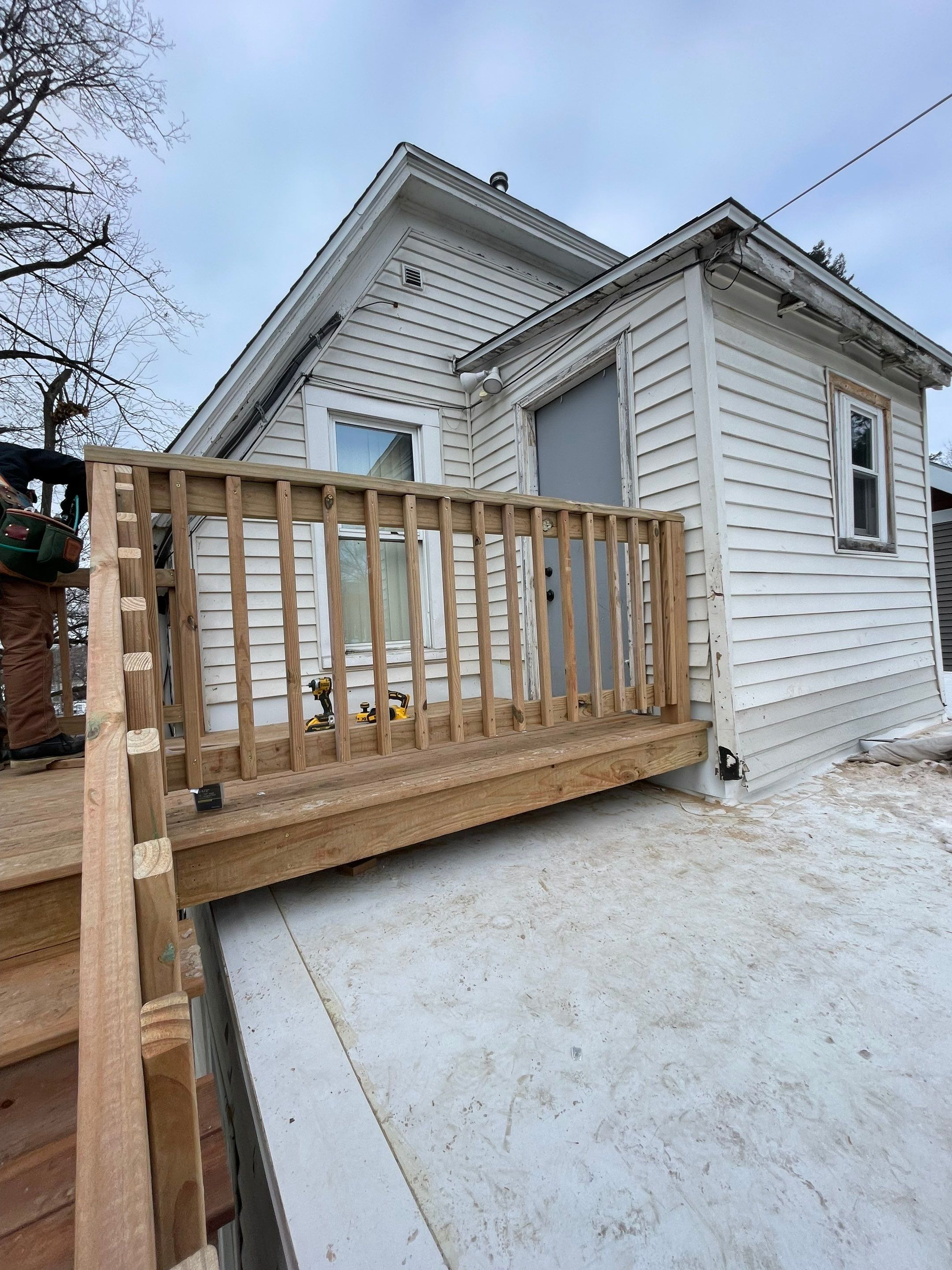 Deck Installation using Treated Lumber by Avalon Roofing and Exteriors
