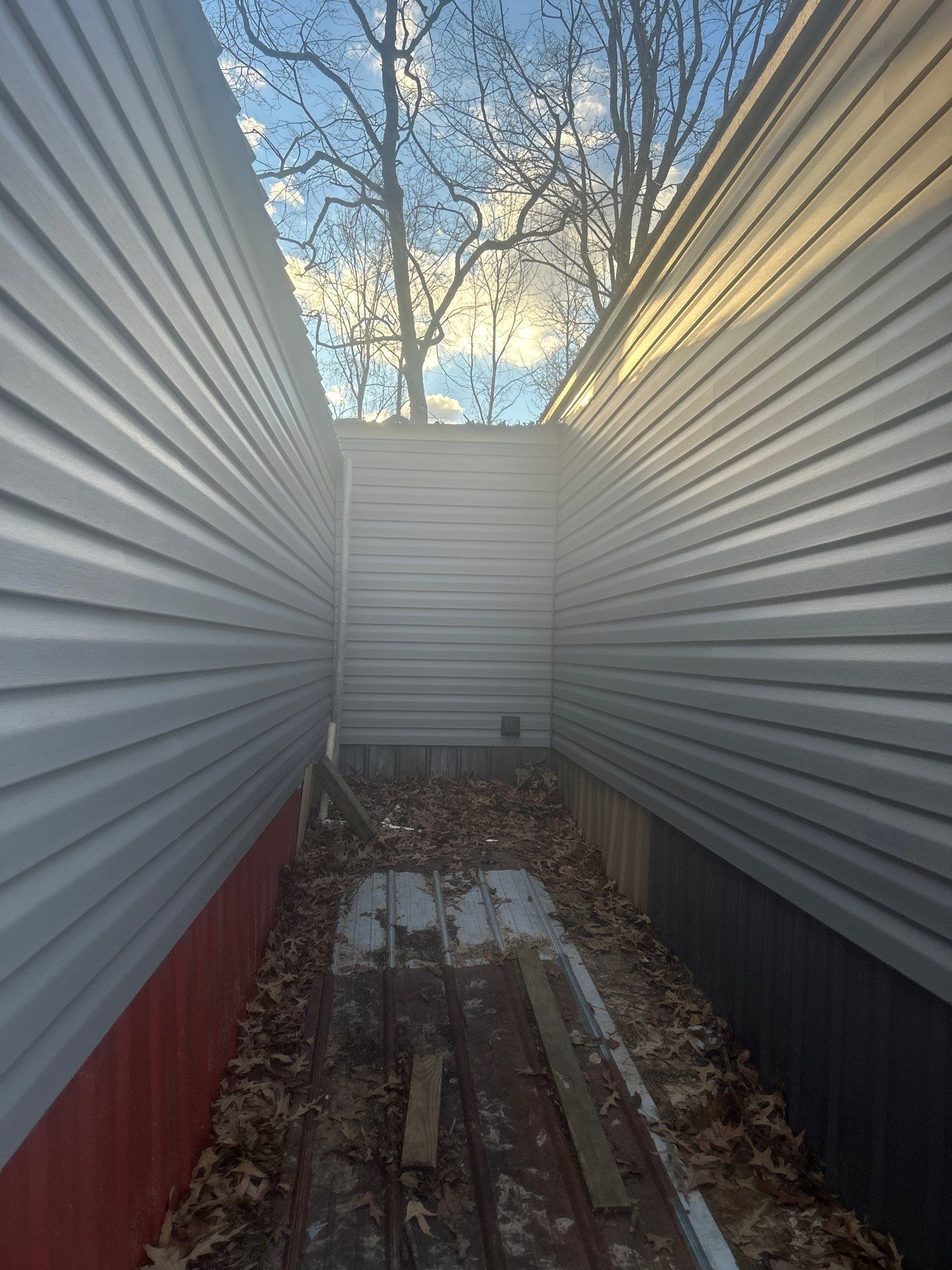 Residential Siding Repair in Bankston (Vinyl) by The Roofing Dudes