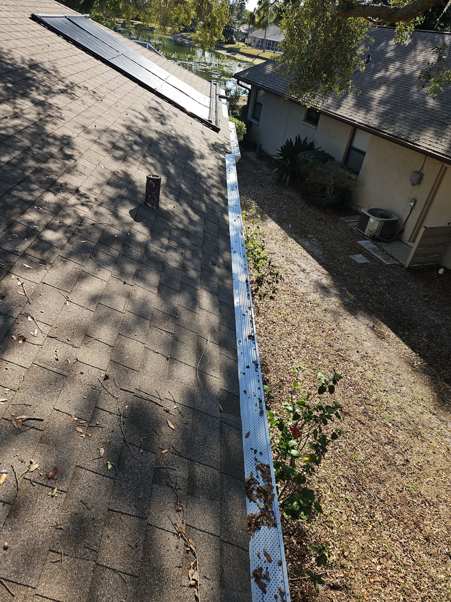 Seamless Aluminum Gutter Installation using 6 Inch Seamless Gutters in Sarasota FL by Gutter Professors