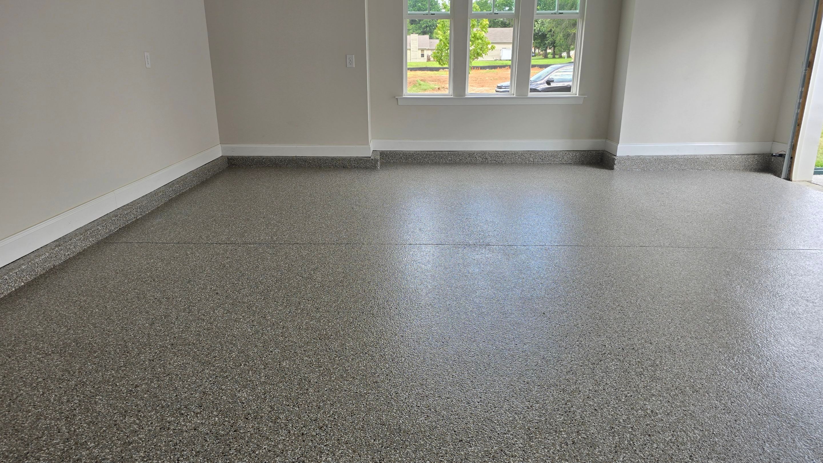 Garage using Creekbed by Elite Floor Solutions