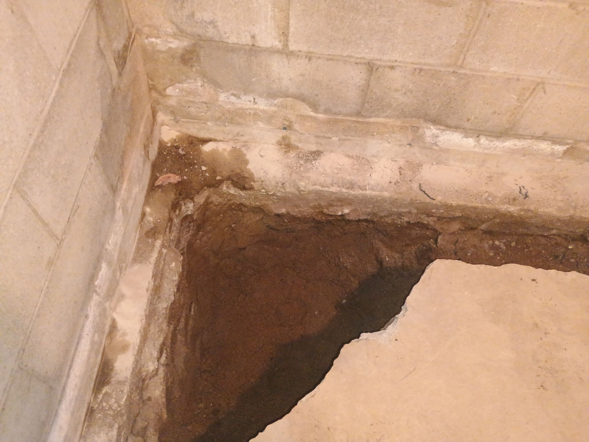 Interior Drain Tile & Buried Discharge in South Minneapolis by Waterproofing Northeast