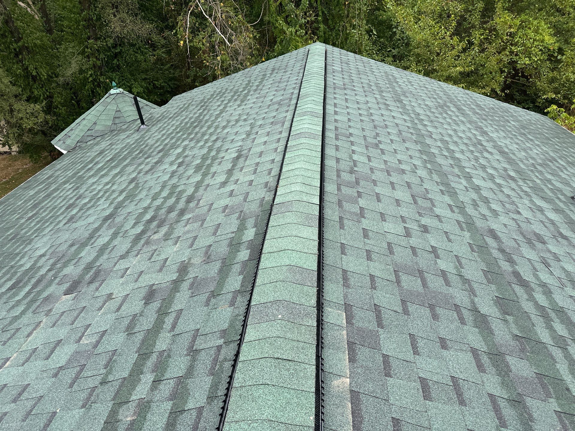 Residential Roofing Install - Atlas Pinnacle Pristine Architectural Shingle - Color Green  by Titan Commercial & Residential Roofing 