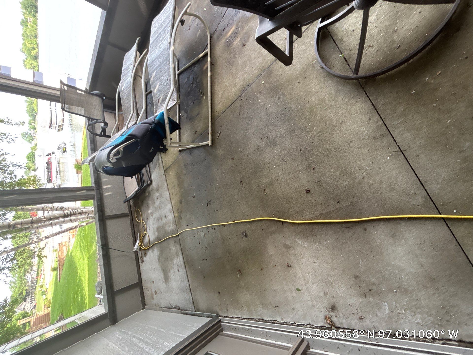 Lakefront Screened Patio Concrete Coating Installation in Wentworth by Select Painting, Coatings & Garage Cabinets