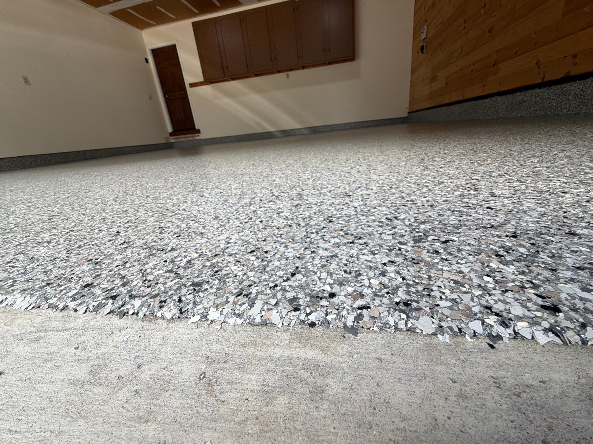 Gray Speckled Epoxy Flake Floor Coating in Muskegon by Gordon Painting