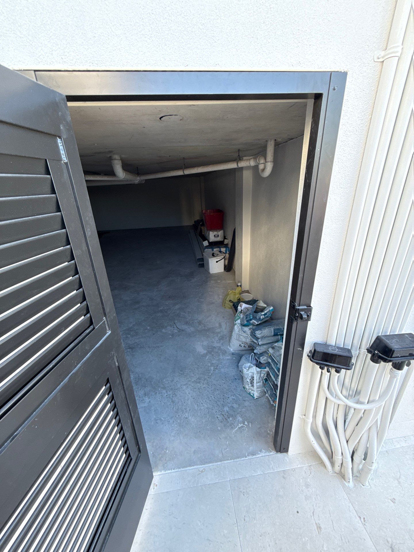 Seamless Aluminum Gutter Installation using black seamless gutters in Sarasota FL by Gutter Professors