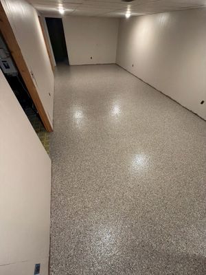 Custom Epoxy Flake Floor Installation for Spring Lake Residence
