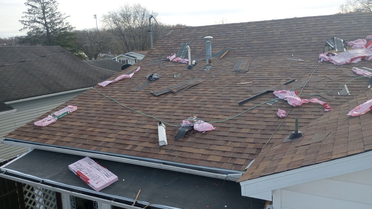 Residential Roofing Installation using Performance Shingles by Mr. Roofer