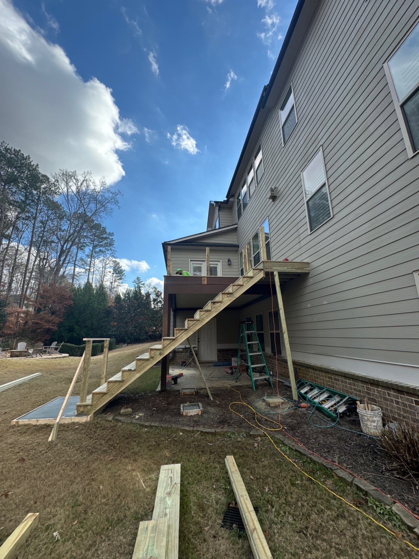 Custom Pressure-Treated Deck with Metal Balusters in Marietta by Swift Home Renovations