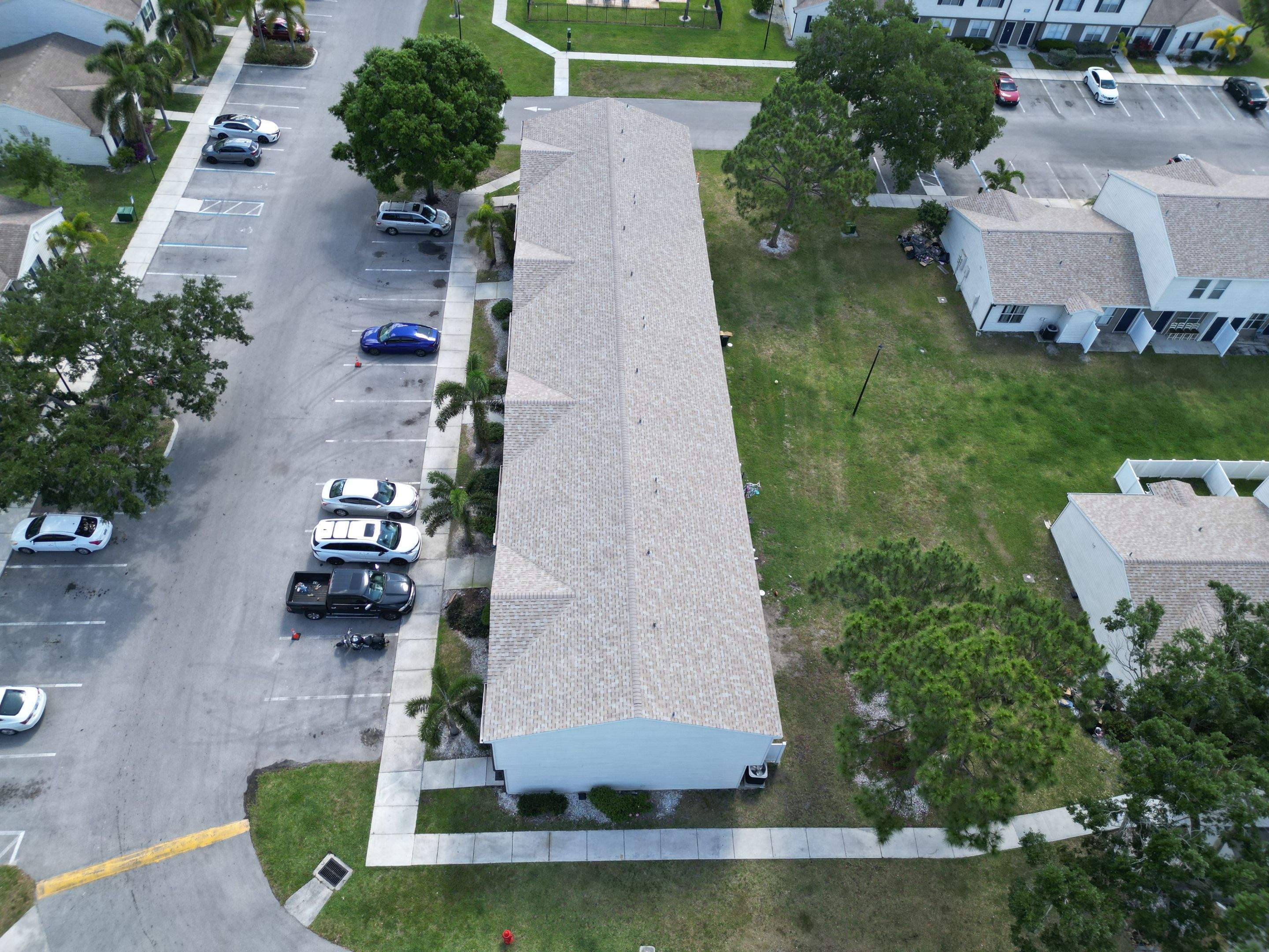 Apartment Complex Shingle Roof Replacement by Sailfish Roofing
