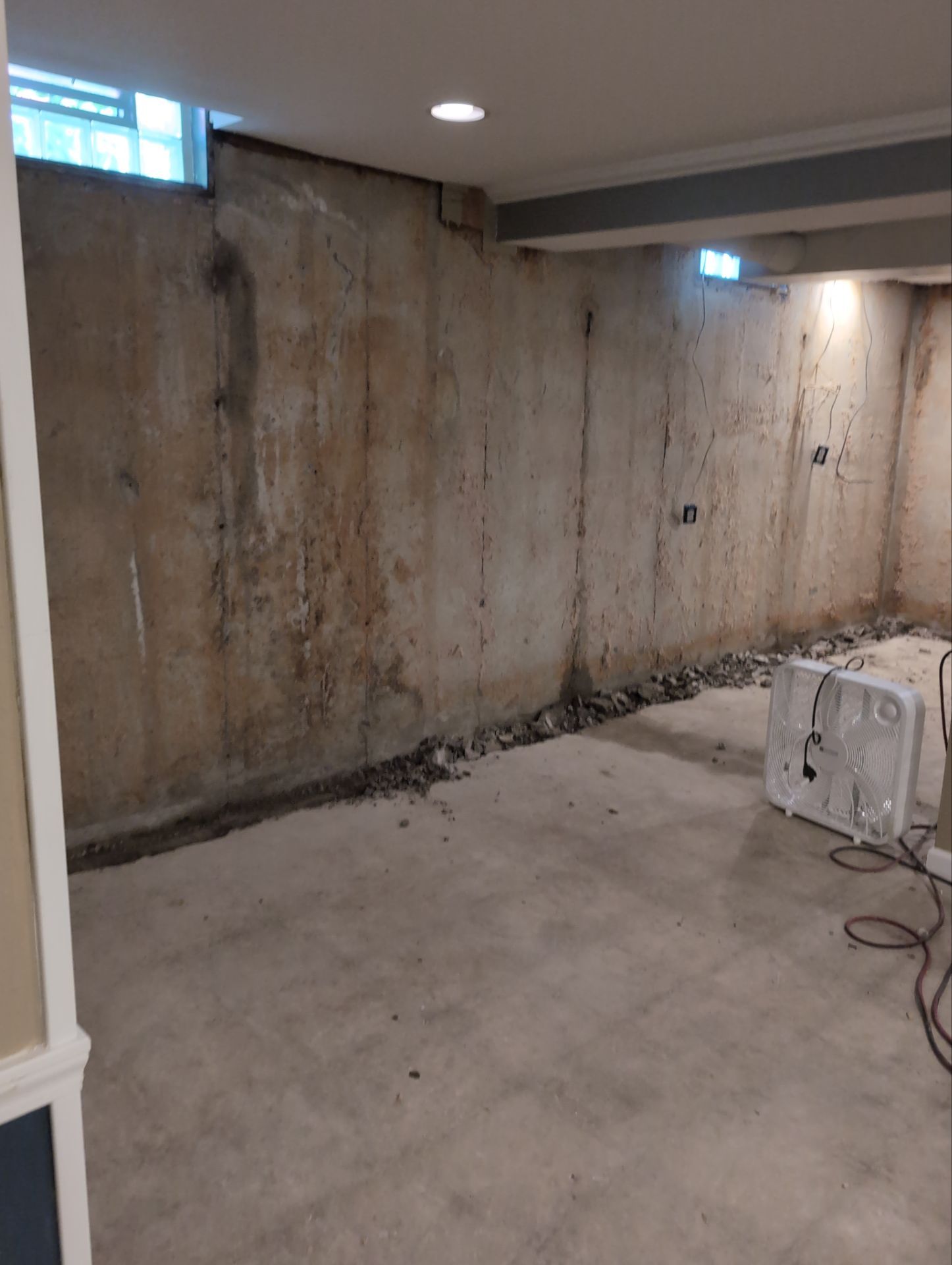 Interior Basement Waterproofing System and Egress Window Installation by Toledo Basement Repair 
