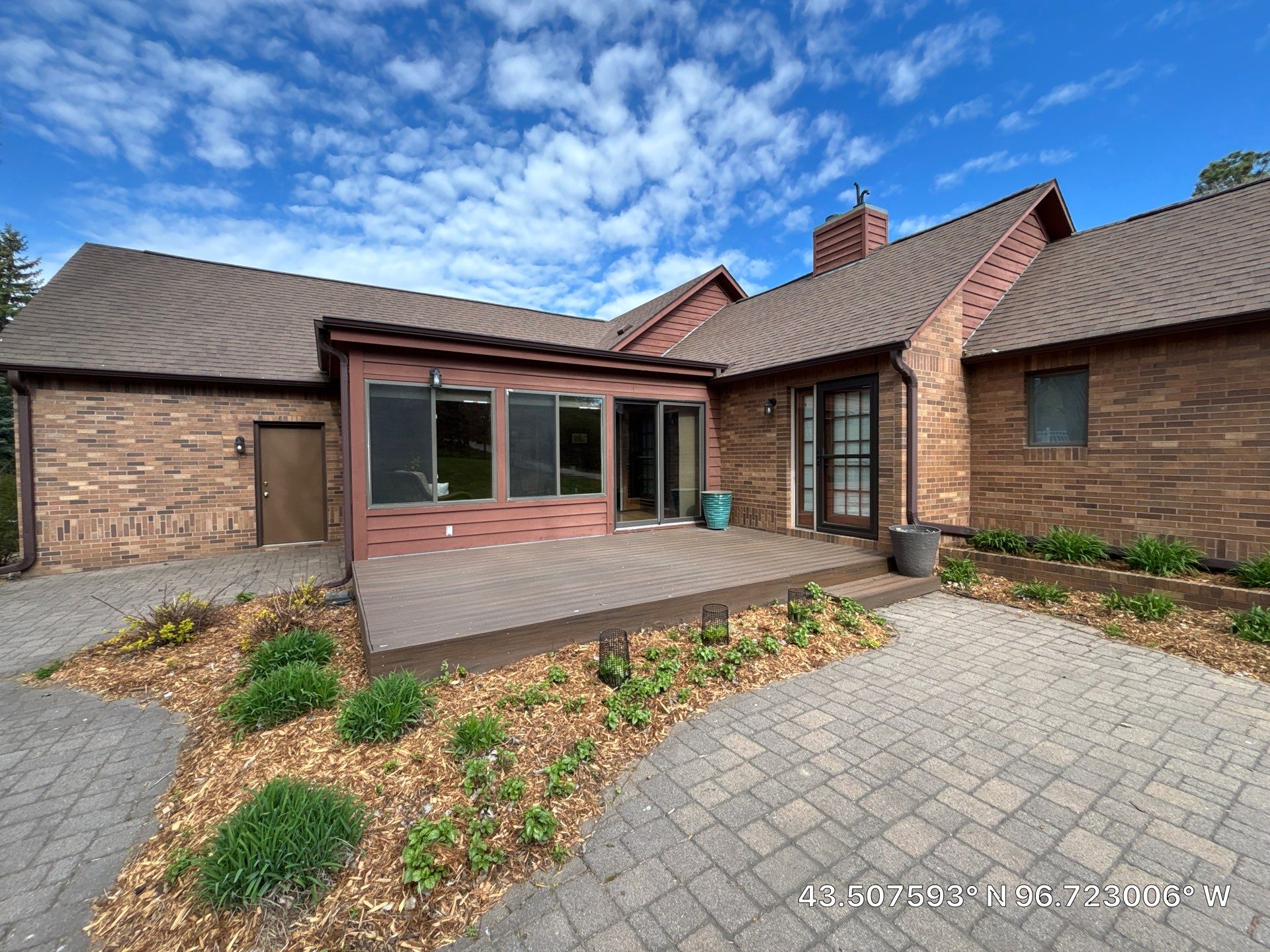 Sioux Falls Exterior Painting and Solid Color Deck Staining by Select Painting, Coatings & Garage Cabinets