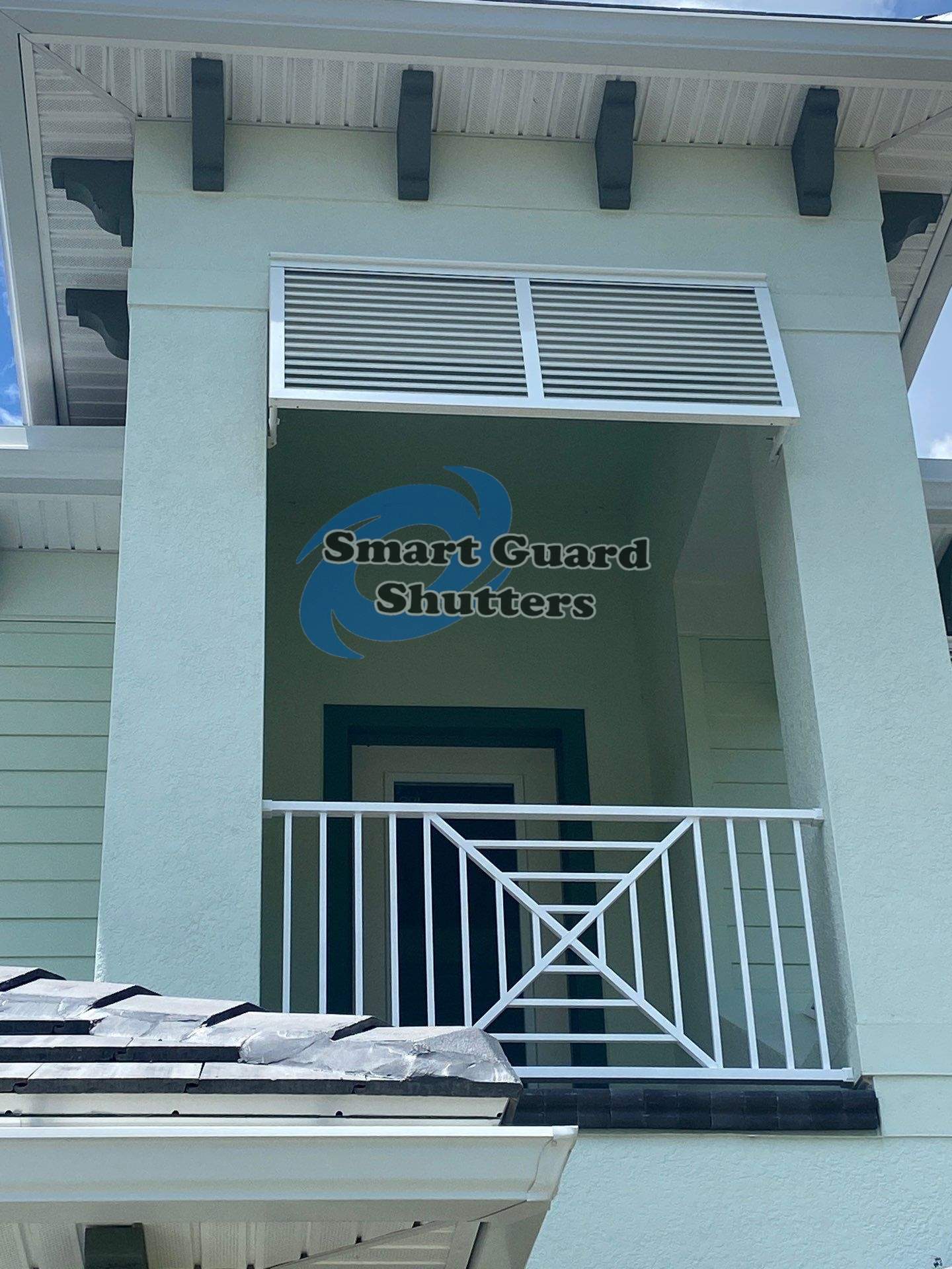Decorative Bahama Shutters in Traffic White by Smart Guard Shutters