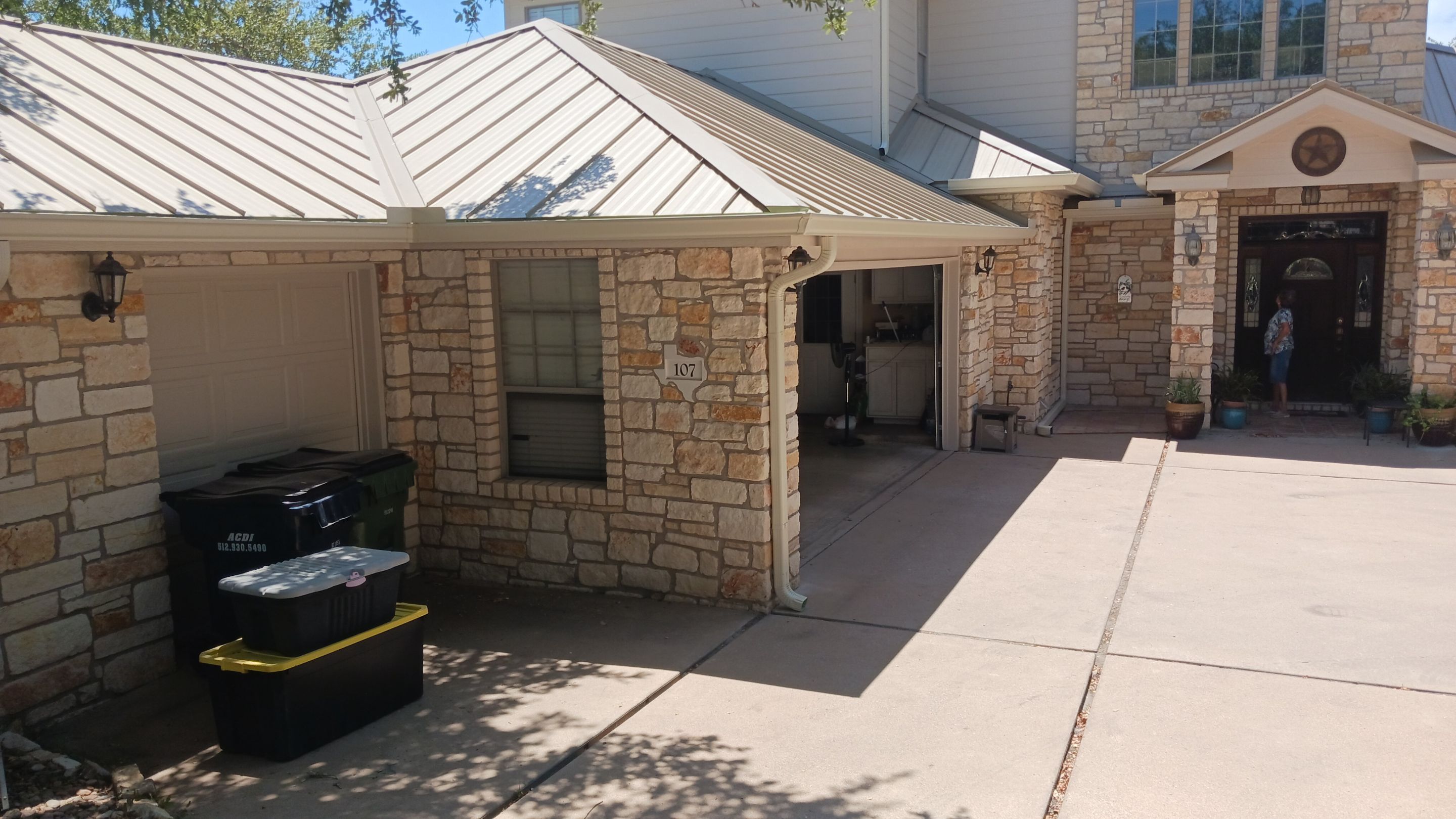 Residential Roof Replacement using 24 GA Double-Lock - Surrey Beige by Action Exteriors Austin