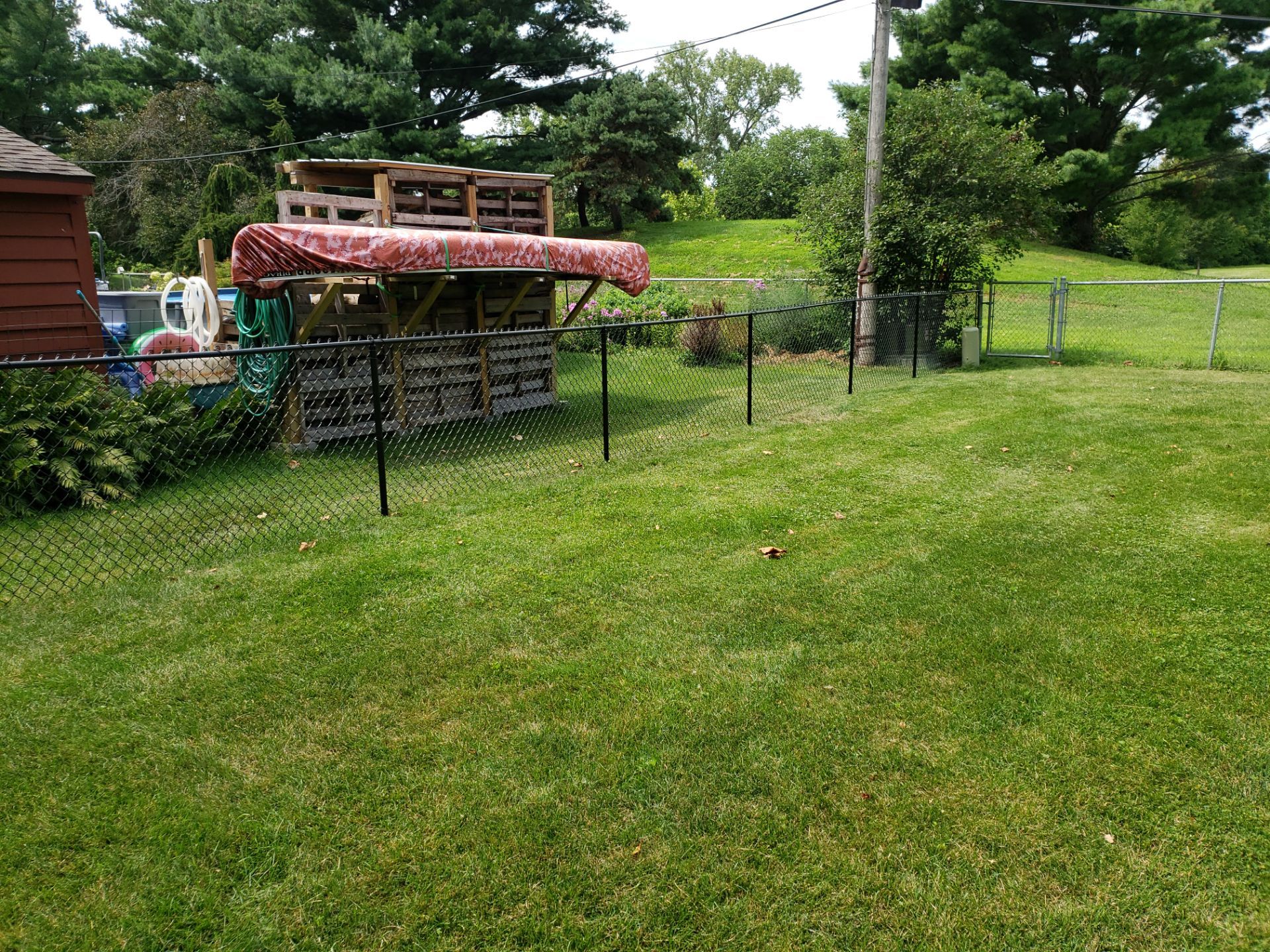 Black Chain Link Fence Installation in Cedar Falls by Perfect Picket Fence and Stain