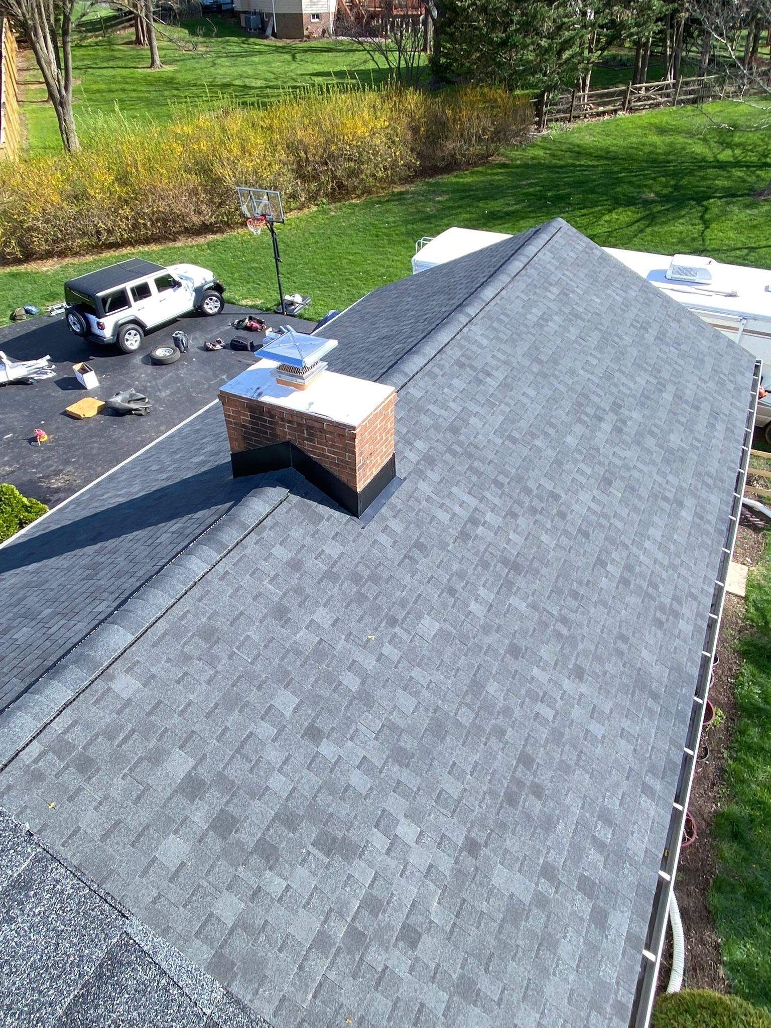 Residential Roofing Installation using Atlas Pinnacle Pristine Black Architectural Shingles by Frederick Roof Repair