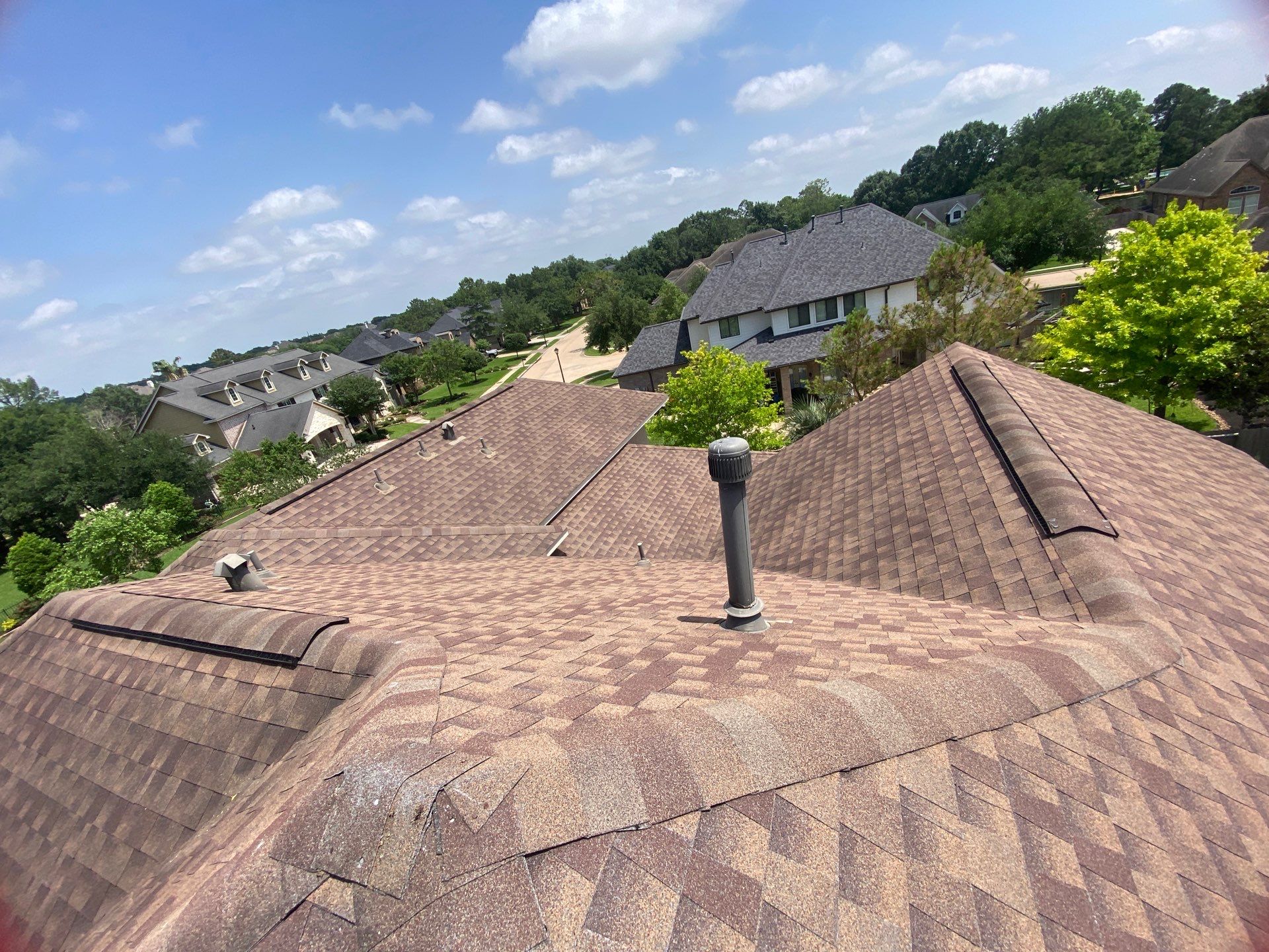 Hail Damage using Owen's Corning Duration (Lifetime) Shingles by Roof Repair Company