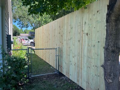 Pressure-Treated Wood Privacy Fence Installation in Cedar Falls