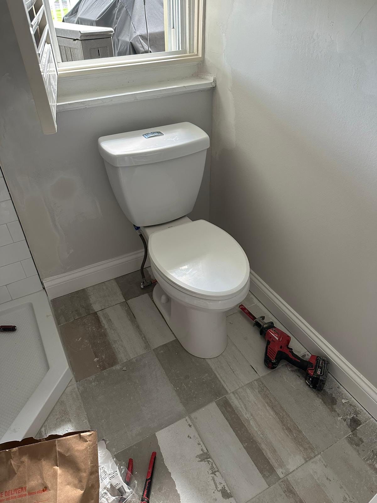 Bathroom Remodel using Cabinets by Home Concepts Construction