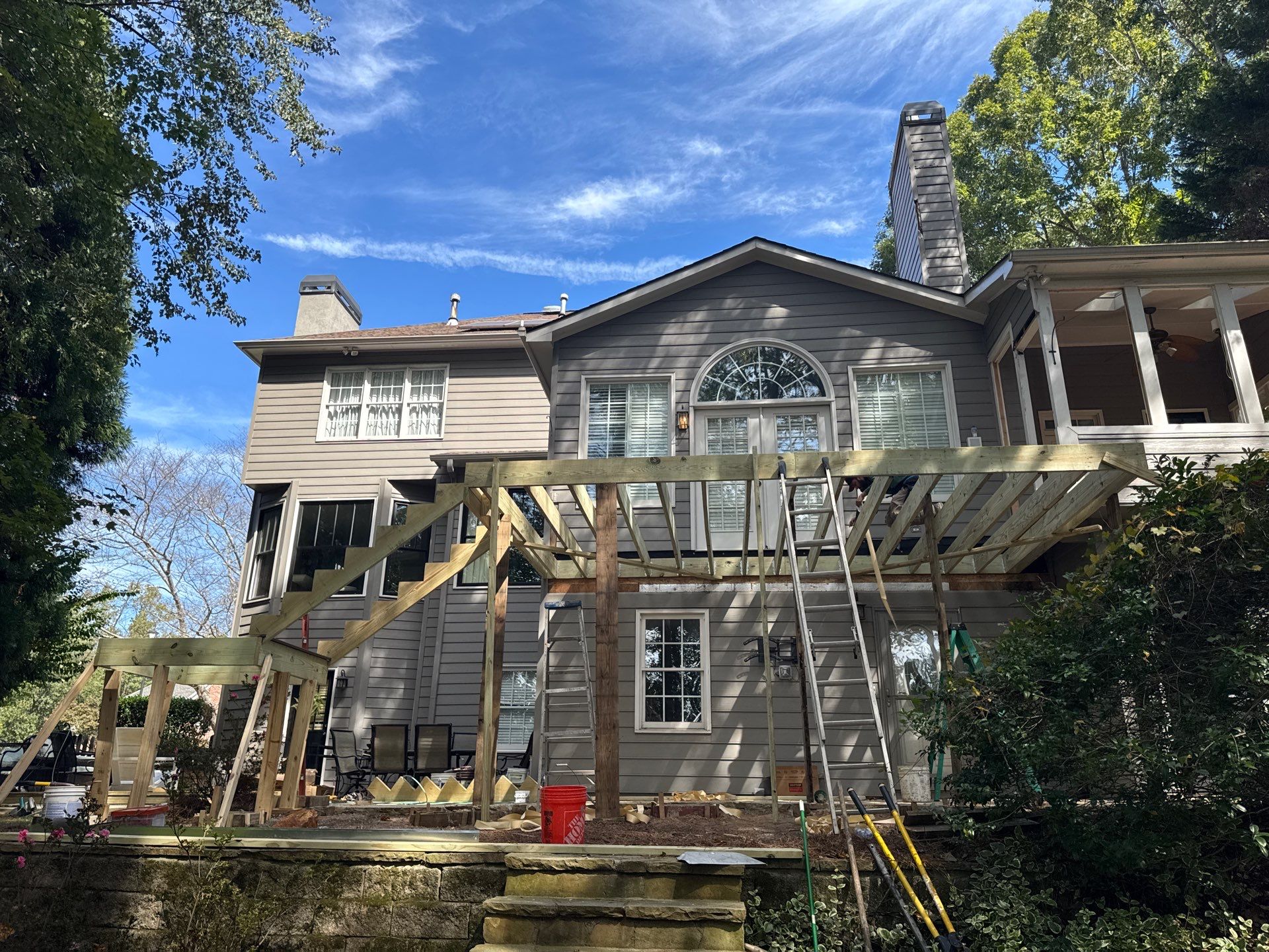 Custom Multi-Level Composite Deck and Sunroom Addition in Suwanee by Swift Home Renovations 