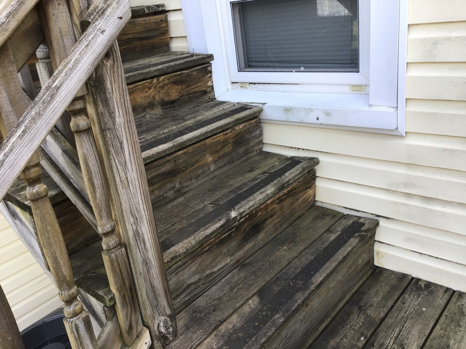 Rebuild balcony flat roofing TREX decking stairway and Railings in Wyandotte, MI by Northwest Construction 