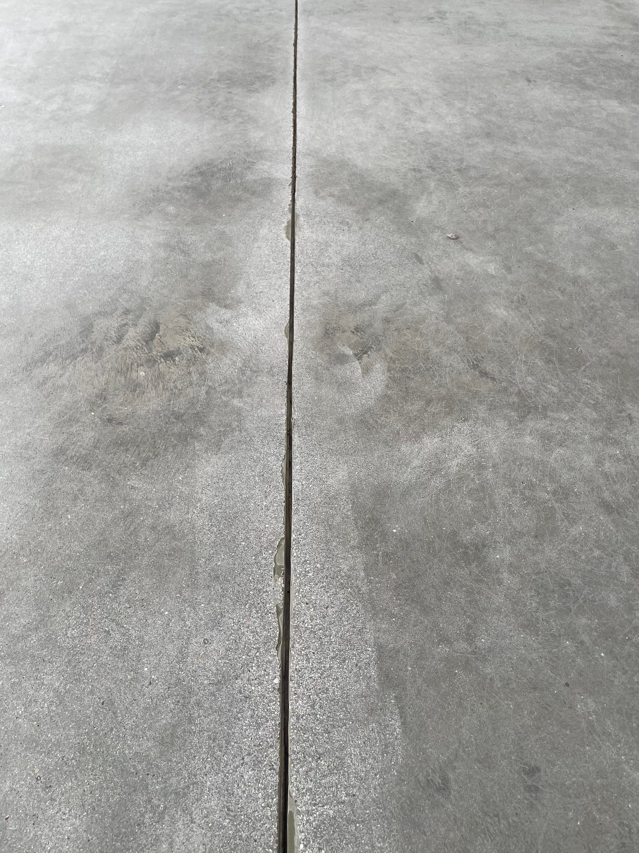 Sioux Falls Garage Floor Transformation with Cabin Fever Decorative Chips by Select Painting, Coatings & Garage Cabinets
