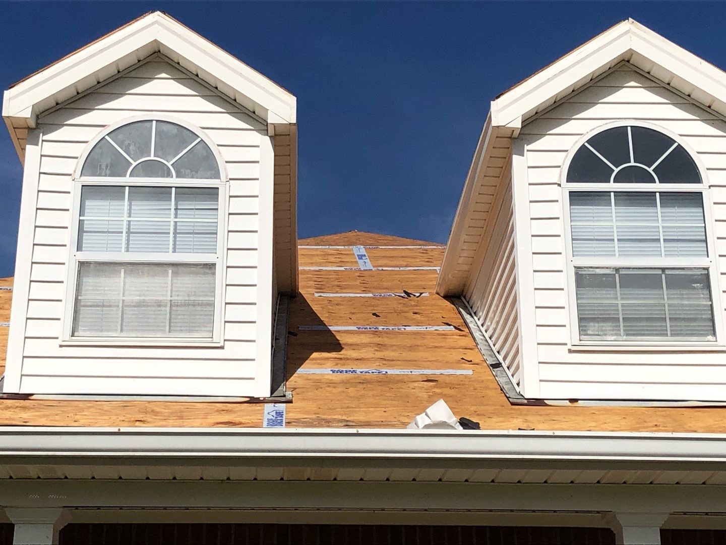 Residential Roofing Installation using Roof Replacement by American Roofing & Construction LLC