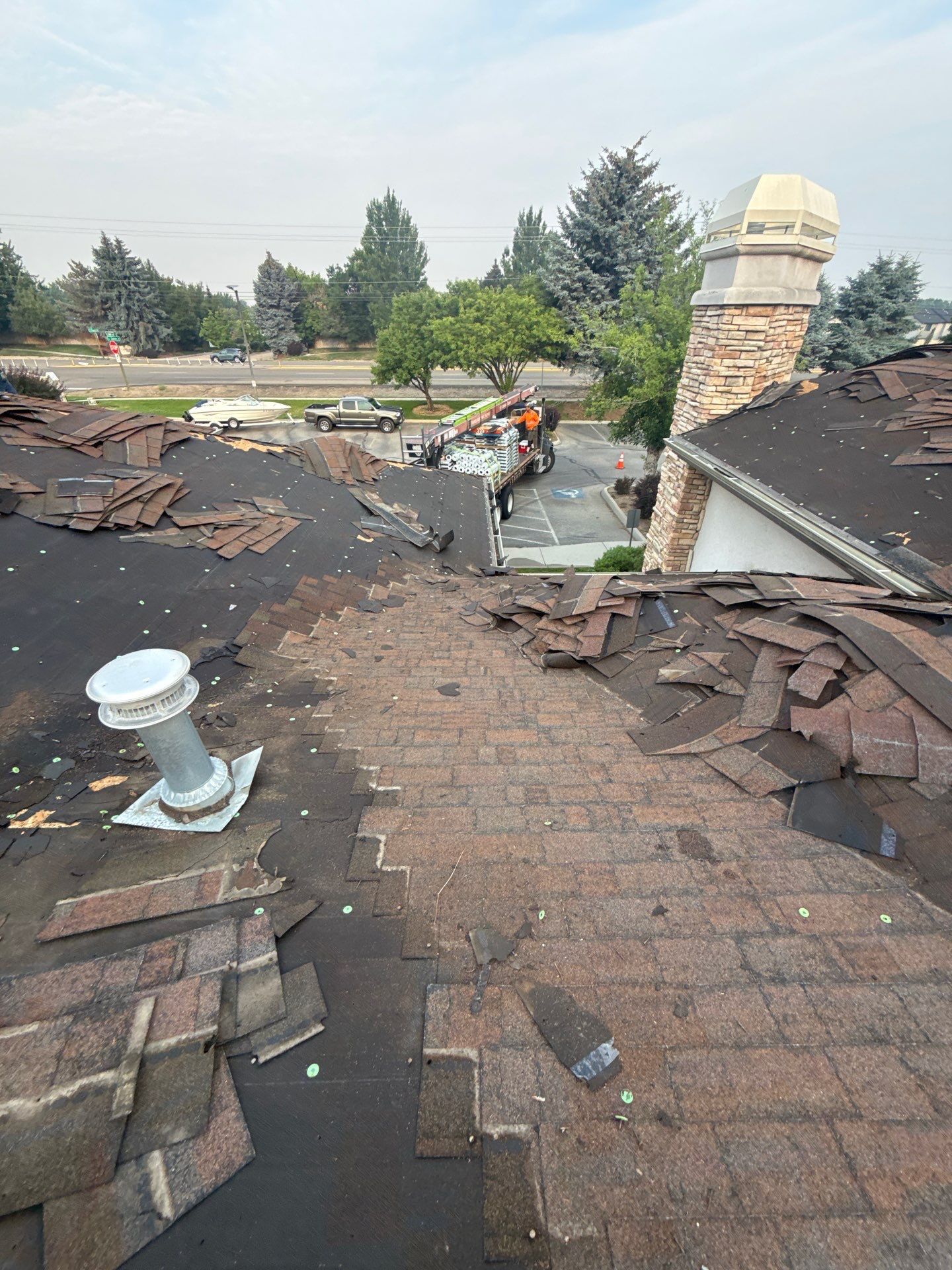 Boise Commercial Roof Replacement with Brown Architectural Shingles by Olive Roofing