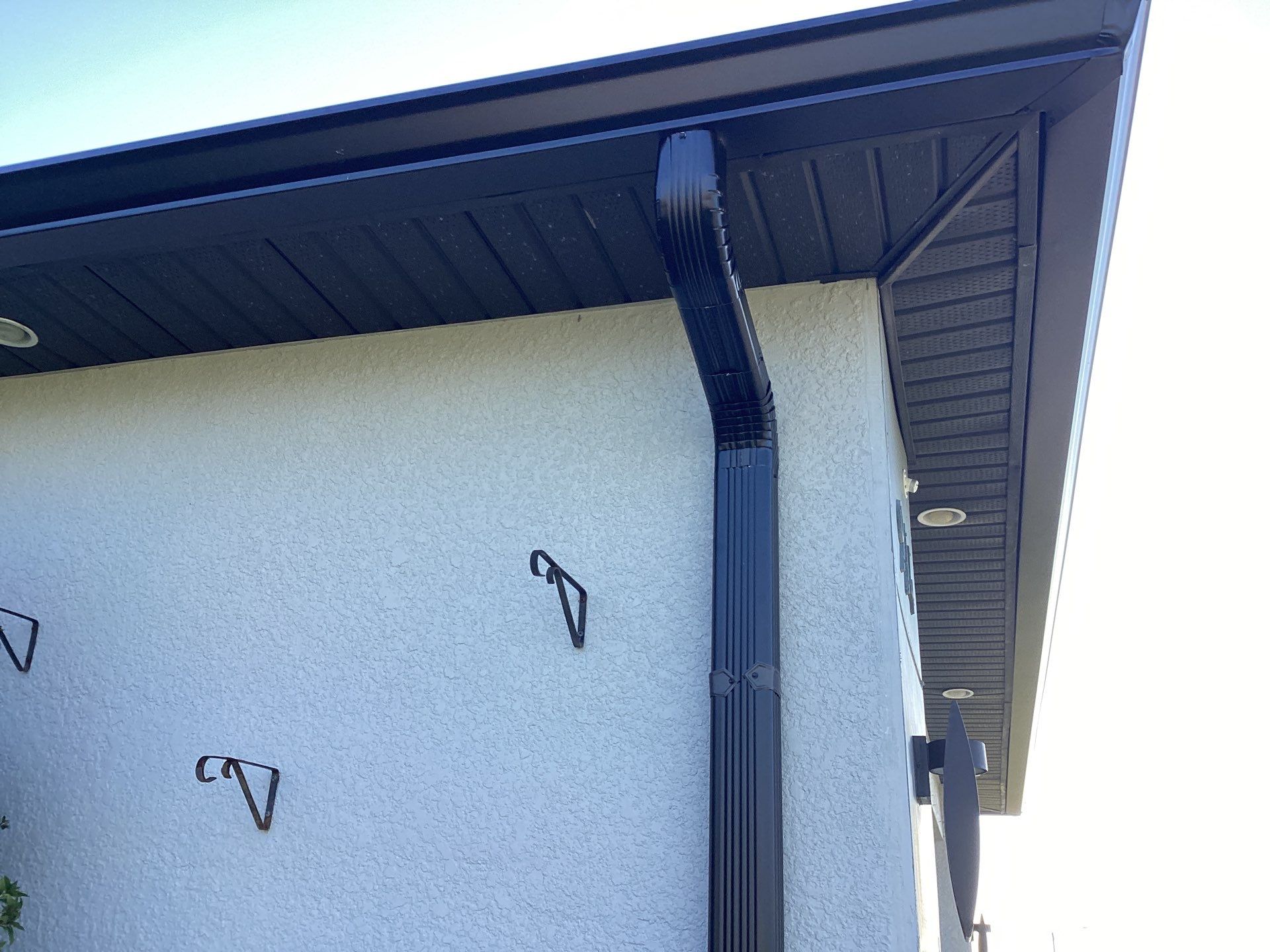 Black Seamless Gutters using 6 Inch Seamless Gutters in Cape Coral FL by Gutter Professors