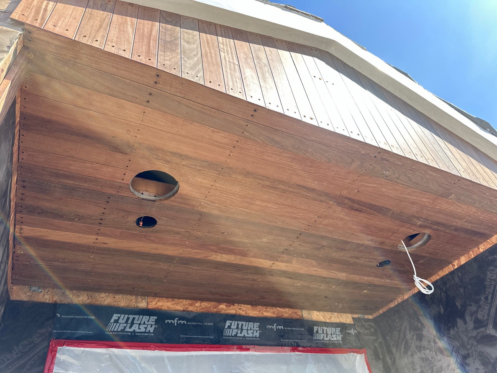 IPE vertical installation by New Era Siding Inc 