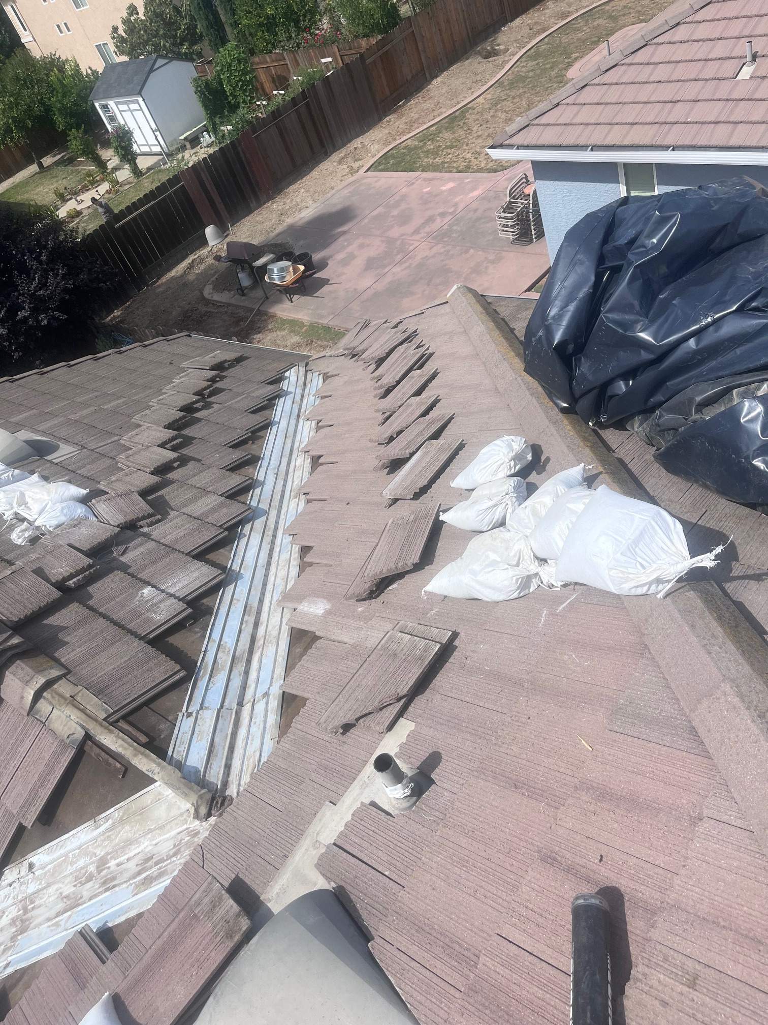 Tile Roof Repair by Grandmark Service Company