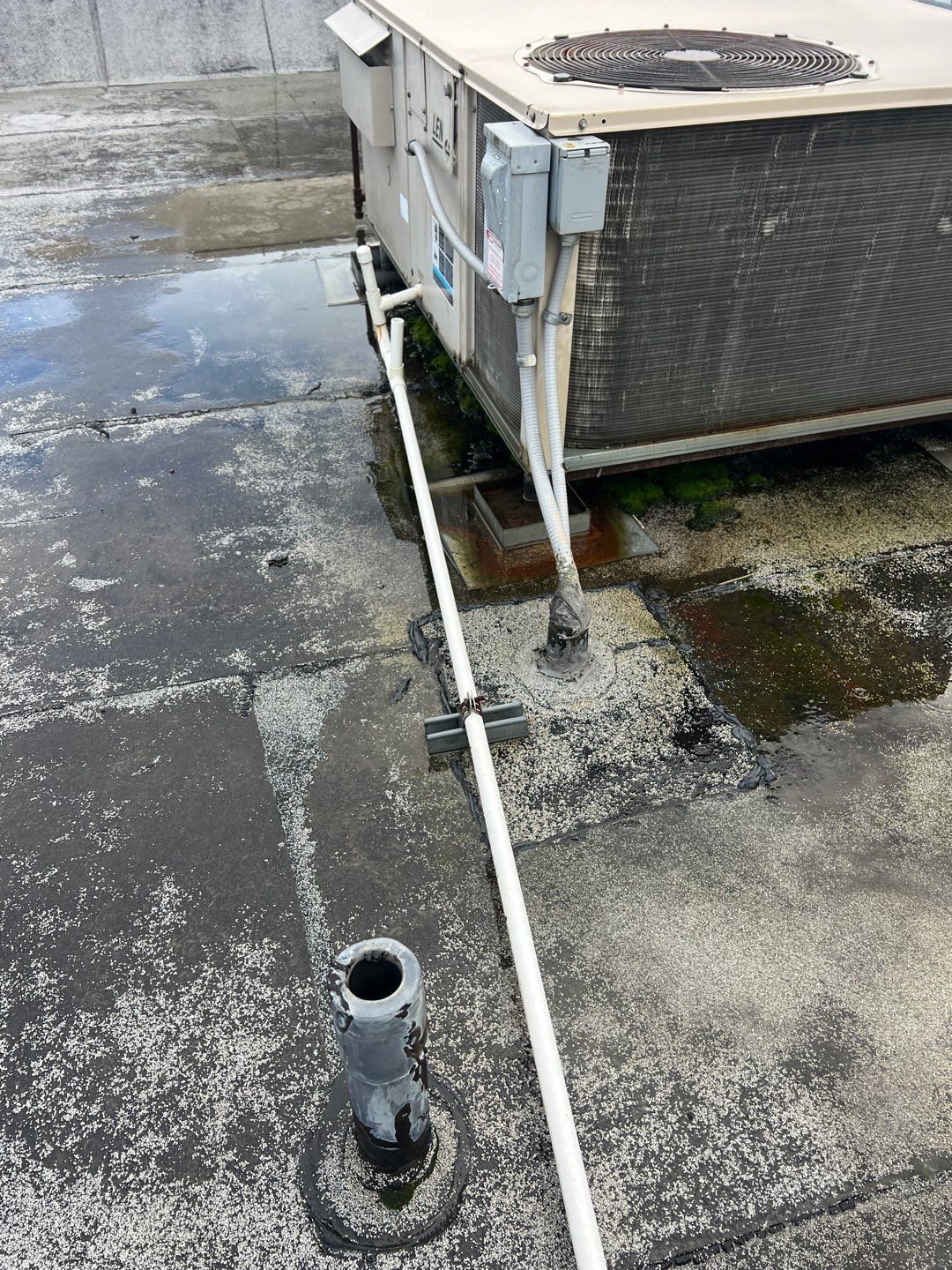 Commercial Flat Roof Installation using GAF 60Mil TPO  by Orezona Building & Roofing Company, Inc.