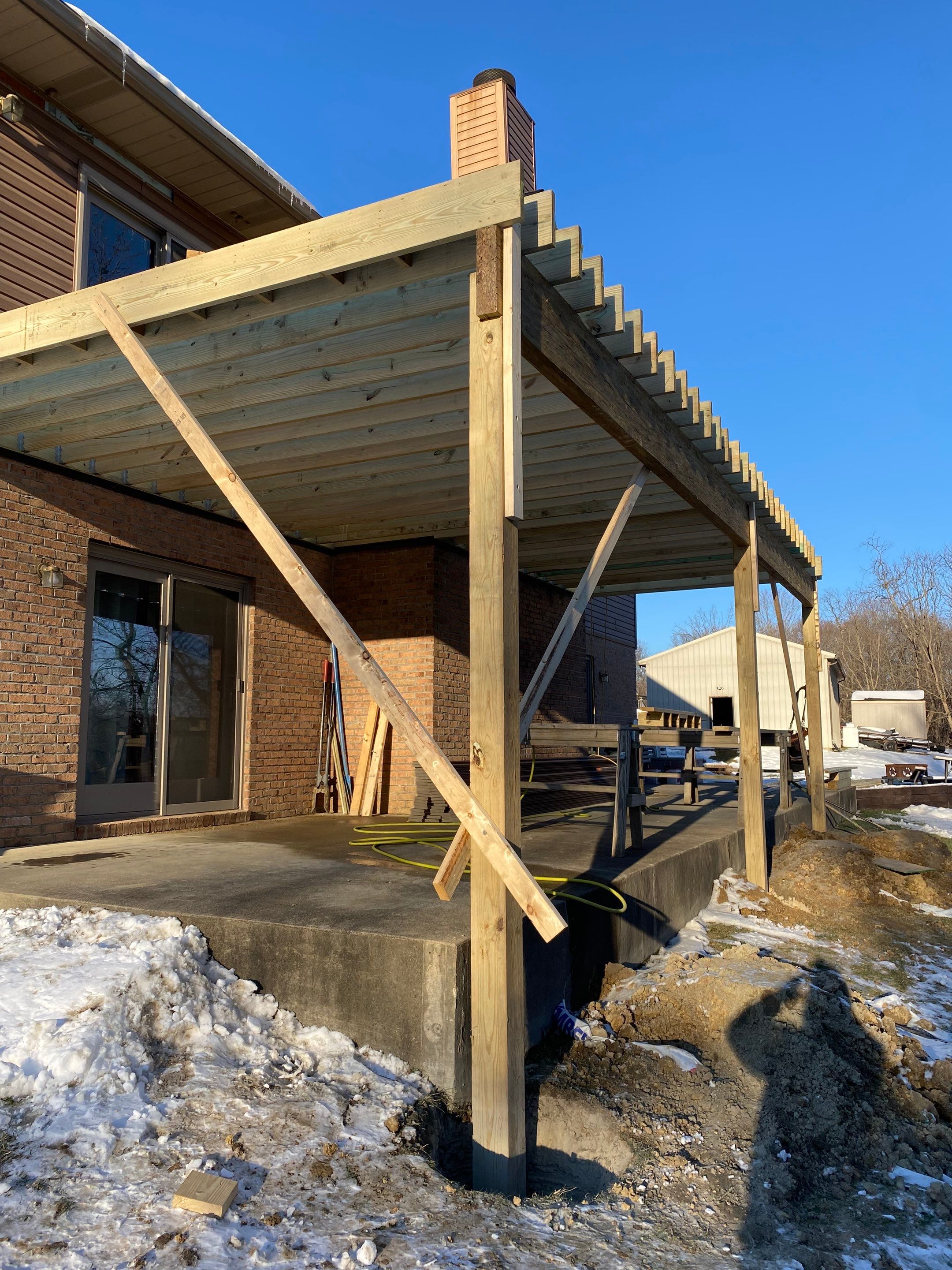 Deck and Roof Build by Cousins Roofing Siding & Decks