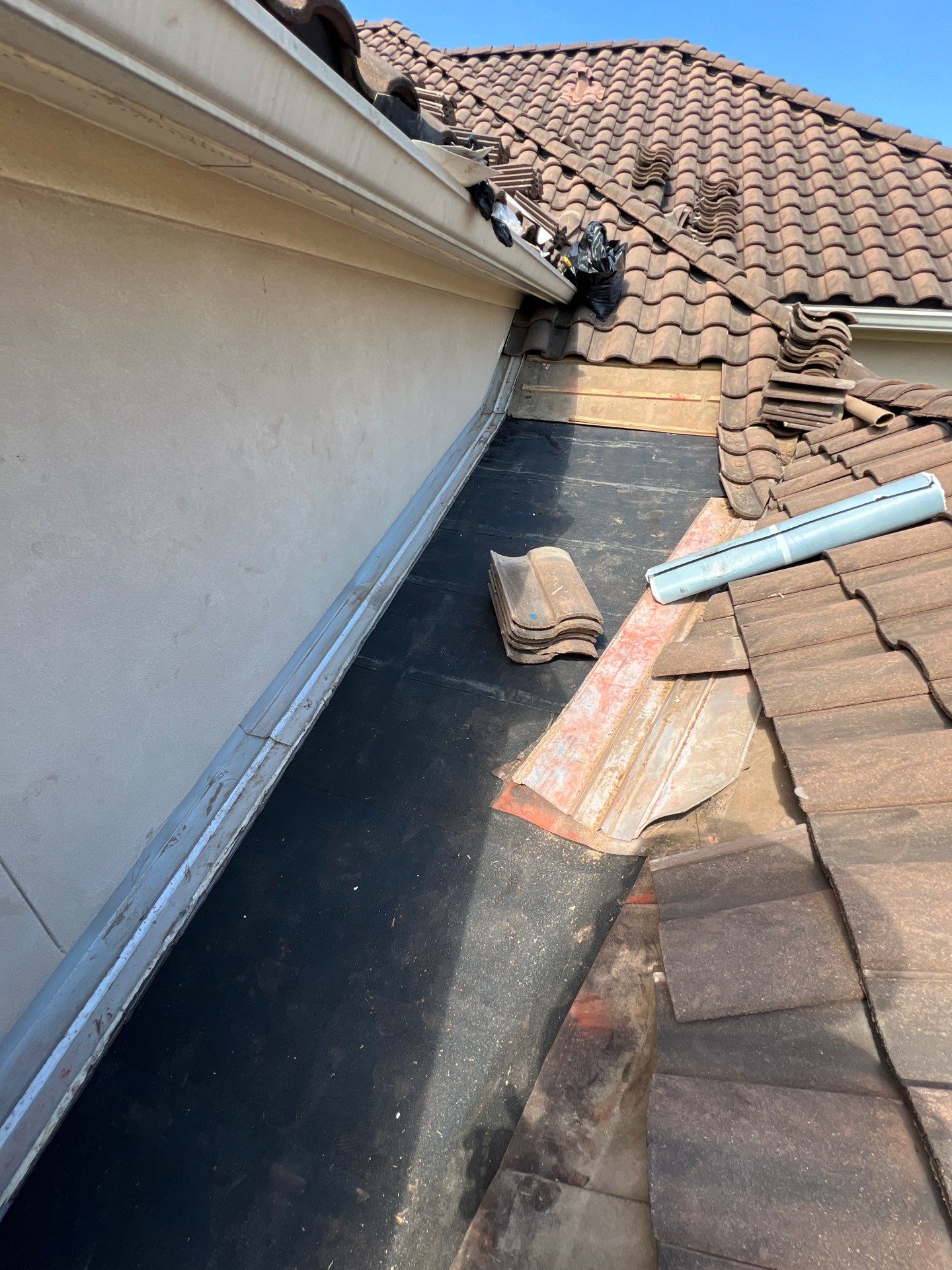 Residential Roofing Repair using tile by Roof Repair Company