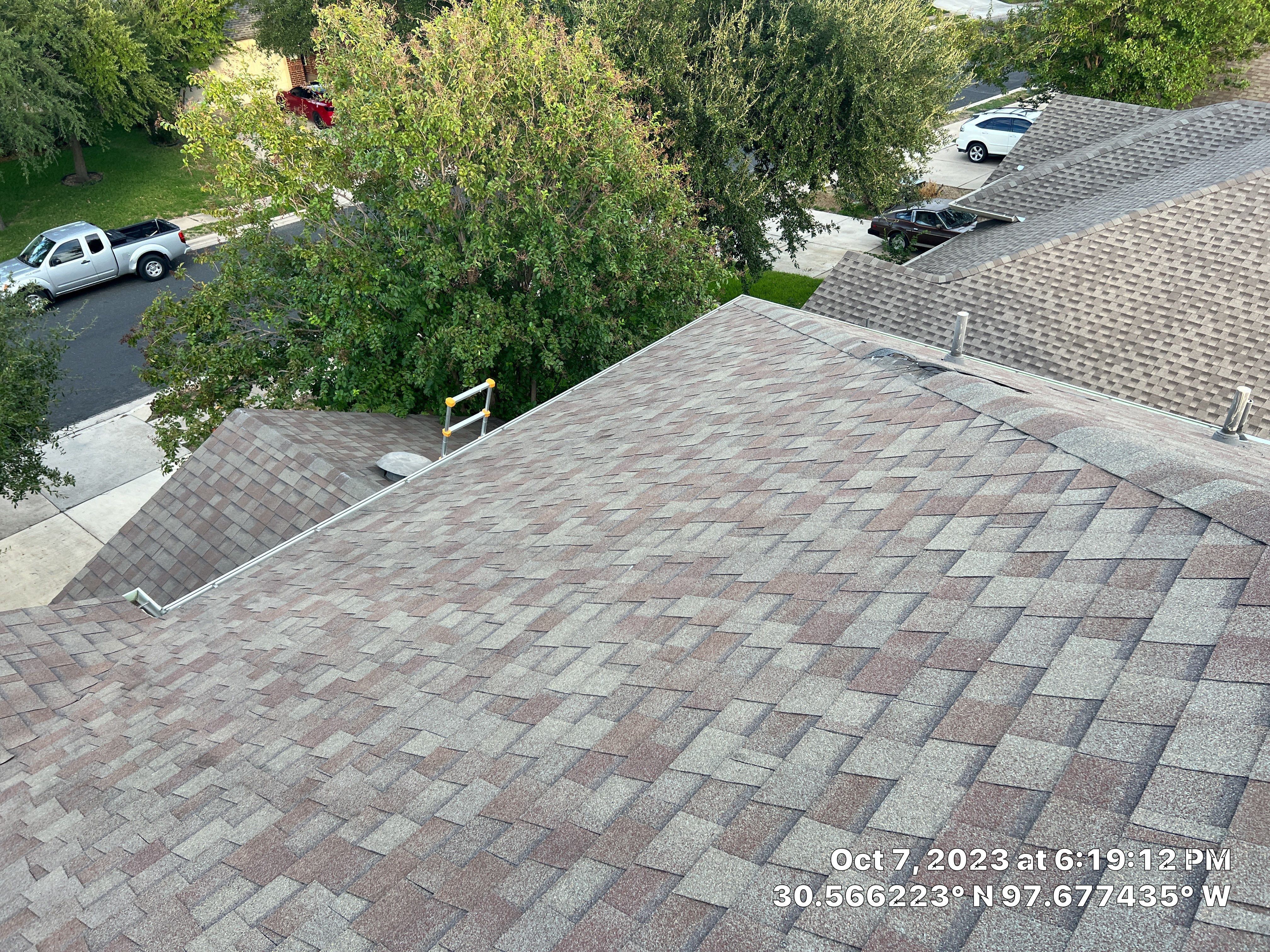 Architectural Shingle Roof Replacement and Storm Damage Restoration in Round Rock by Caliber Restoration LLC