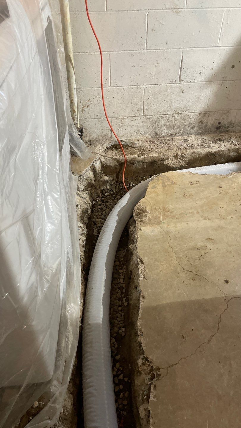 Drain tile & a sump pump for Ruth by Waterproofing Northeast