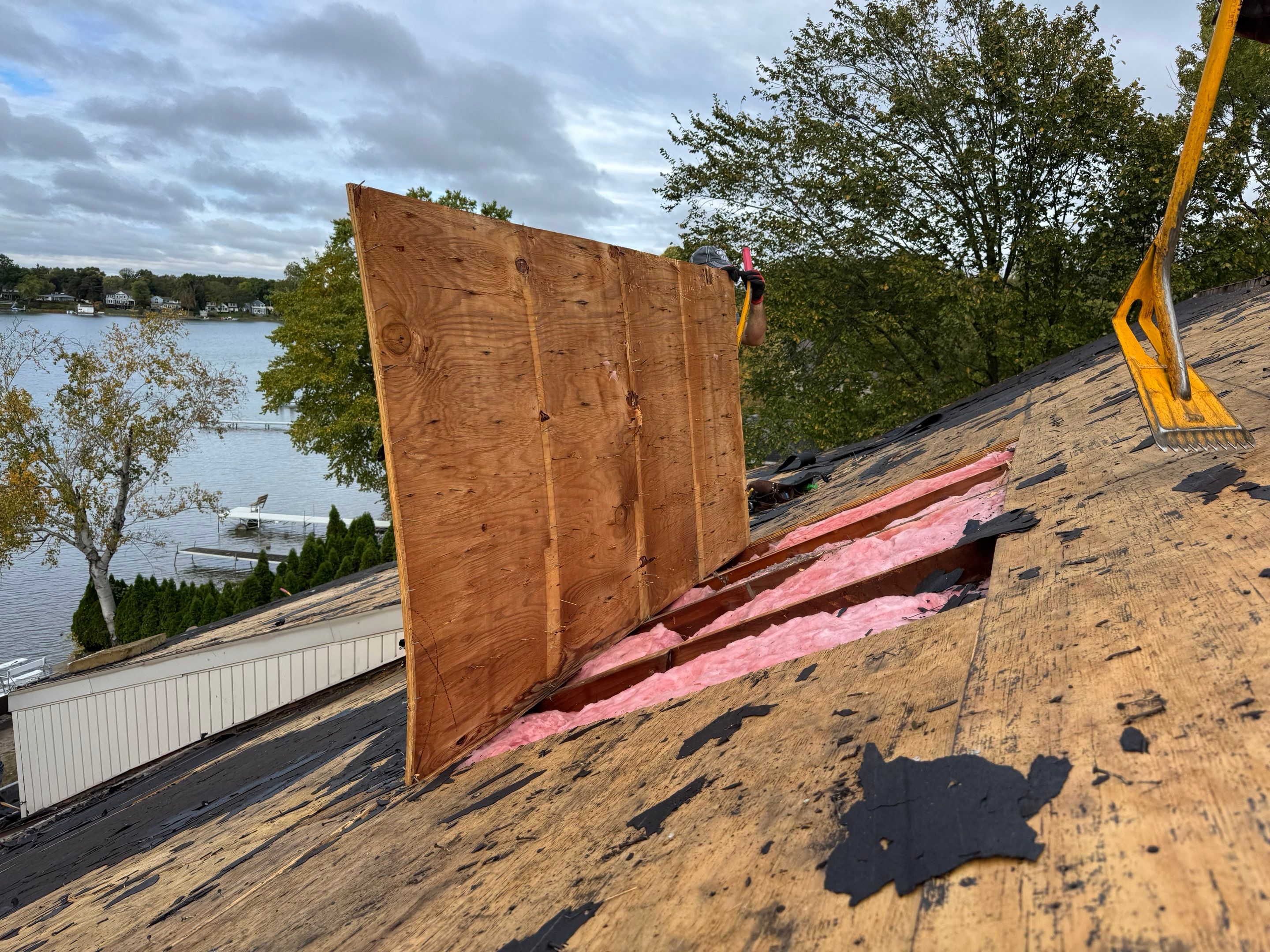 New Shingle Roof with Metal roof accents by Bloomfield Construction & Restoration